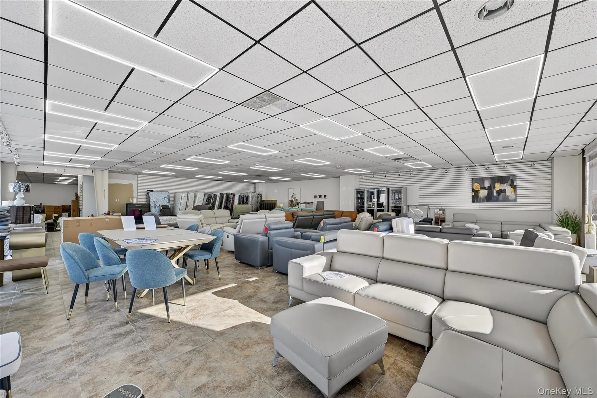Miscellaneous room featuring a drop ceiling Miscellaneous room featuring a drop ceiling