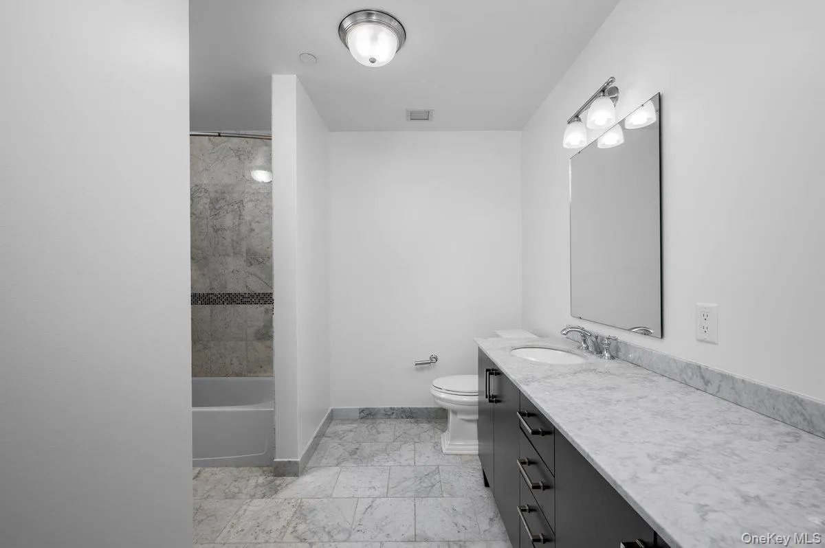 Full bath with vanity and shower / bath combination Full bath with vanity and shower / bath combination