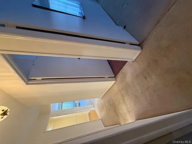 Hall featuring carpet Hall featuring carpet