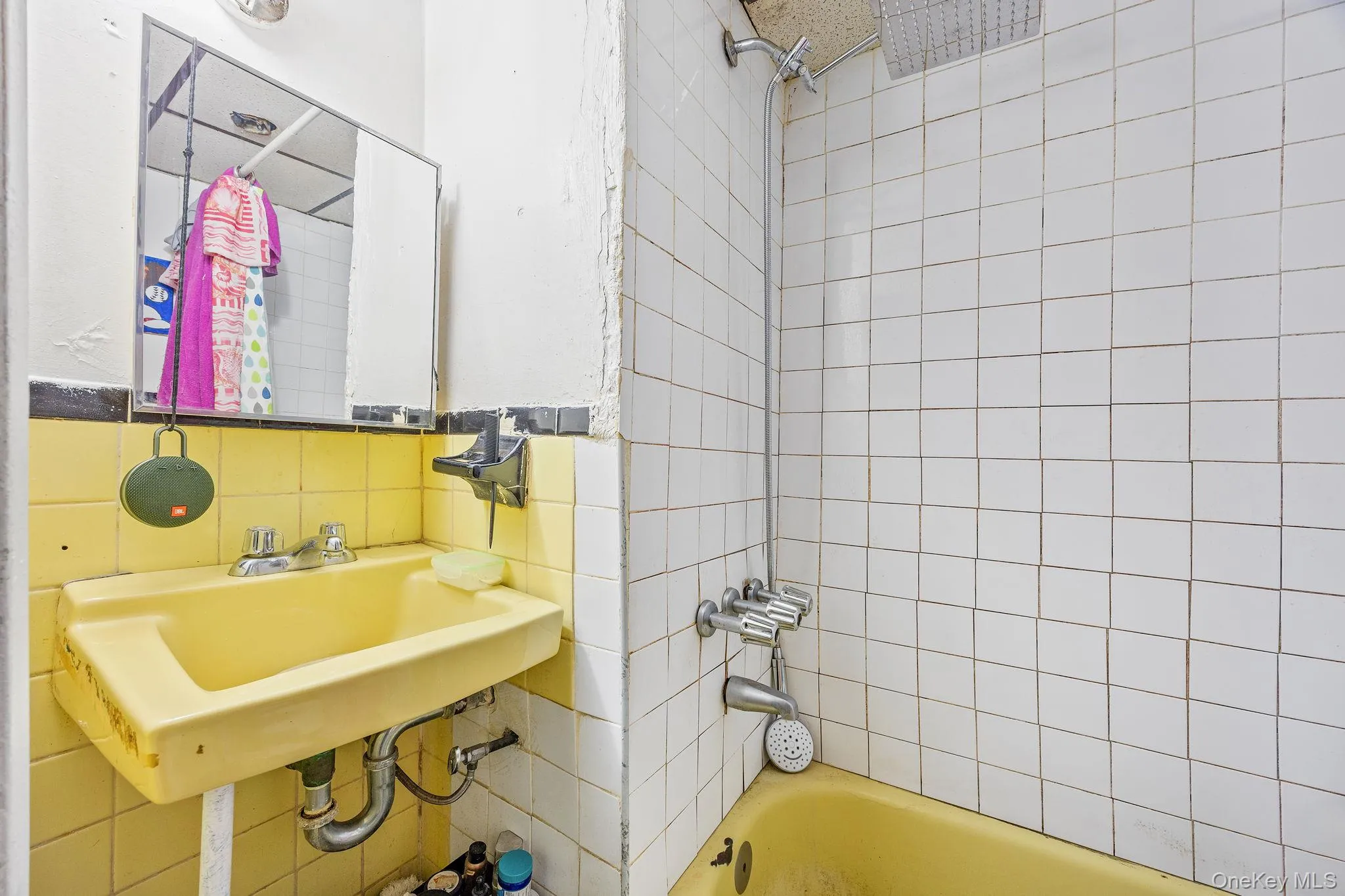 Bathroom with shower combination and tile walls Bathroom with shower combination and tile walls