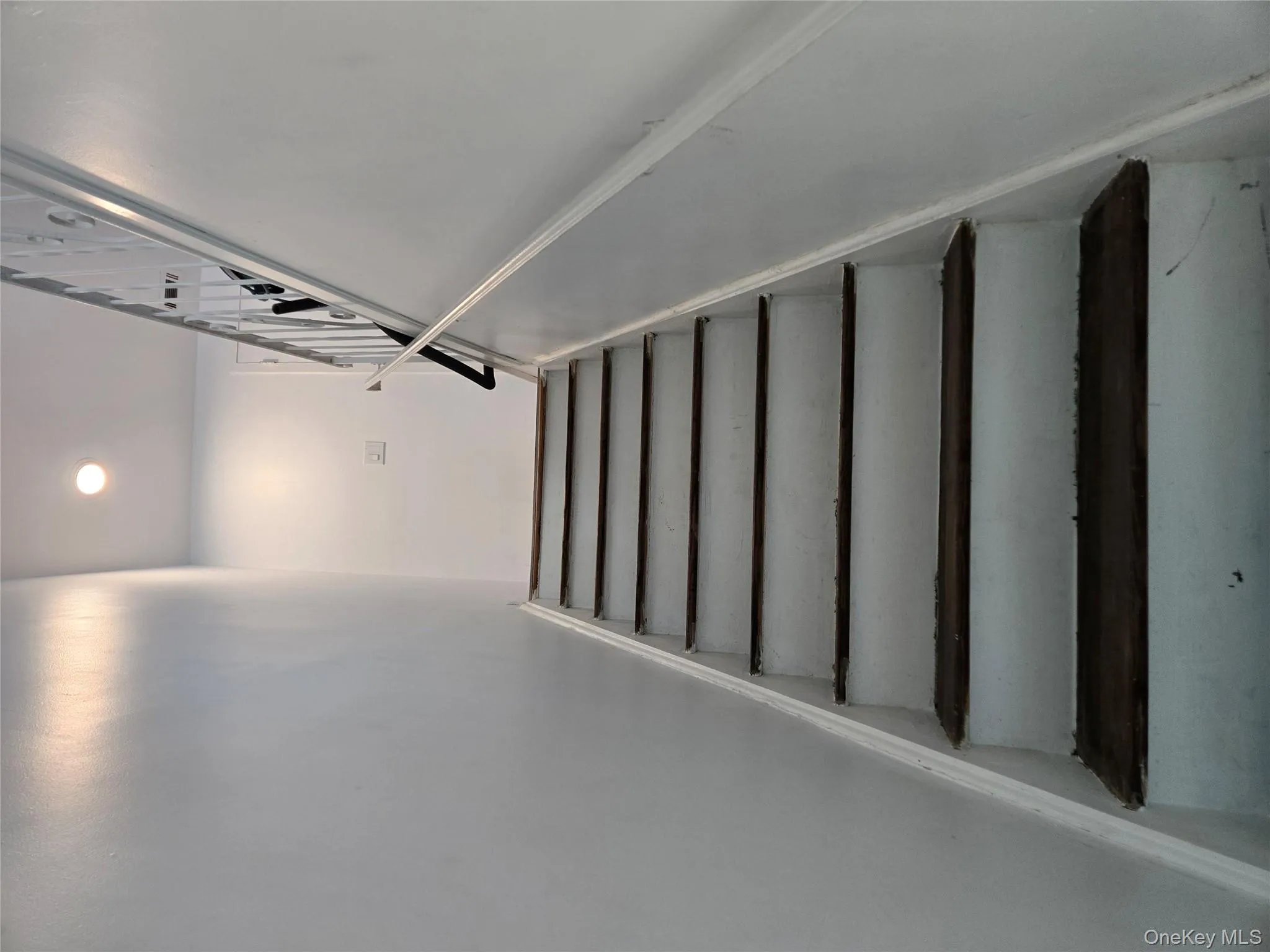 Stairway featuring recessed lighting Stairway featuring recessed lighting