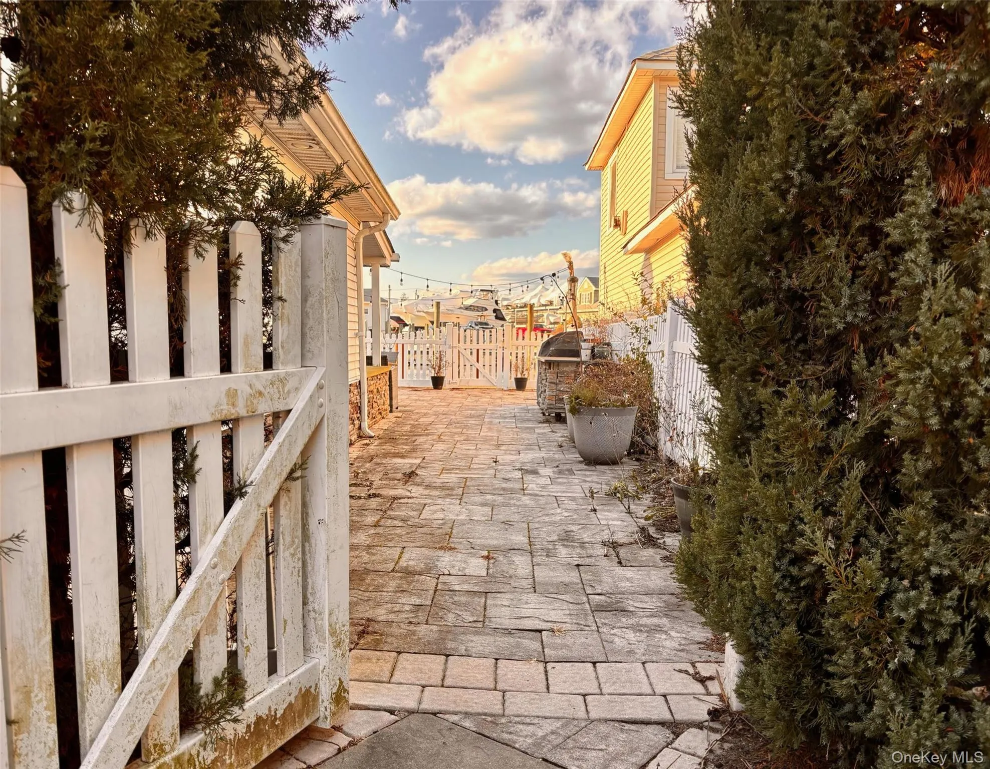 View from Rear Yard to Patio and Dock View from Rear Yard to Patio and Dock