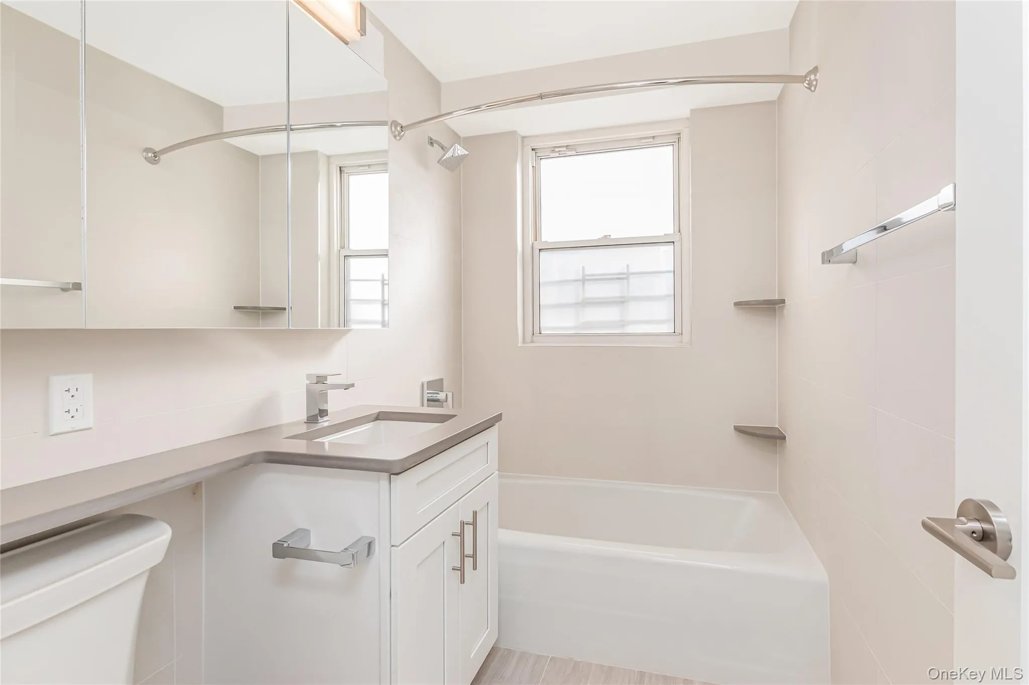 Full bath with tub / shower combination and vanity Full bath with tub / shower combination and vanity