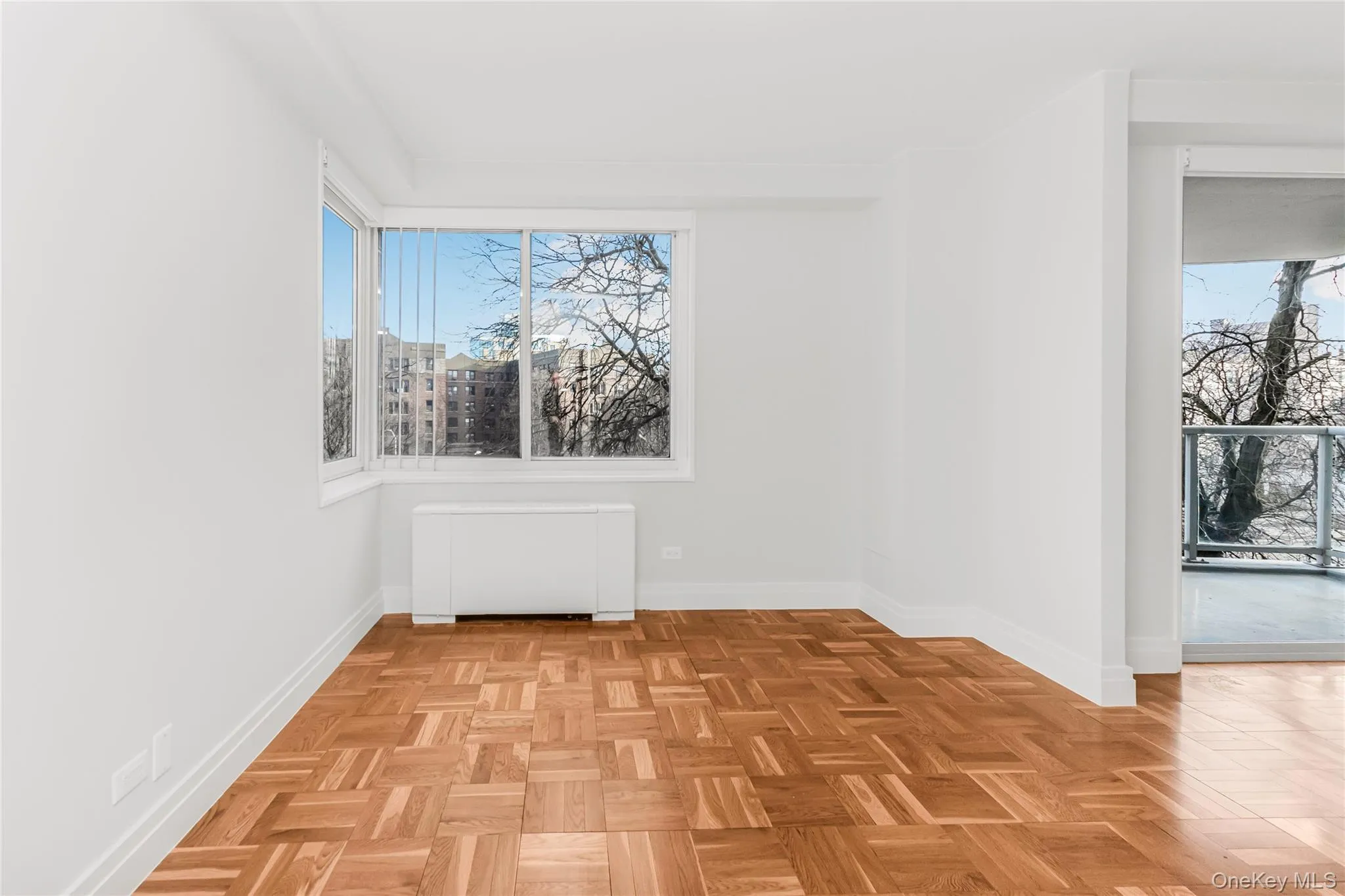 Dining area featuring radiator heating unit and baseboards Dining area featuring radiator heating unit and baseboards
