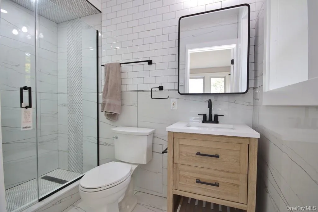 Updated Bathroom with stall shower and sink with vanity Updated Bathroom with stall shower and sink with vanity