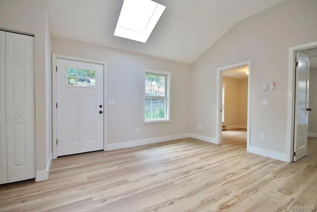 Living Room in Cottage has a sky light Living Room in Cottage has a sky light