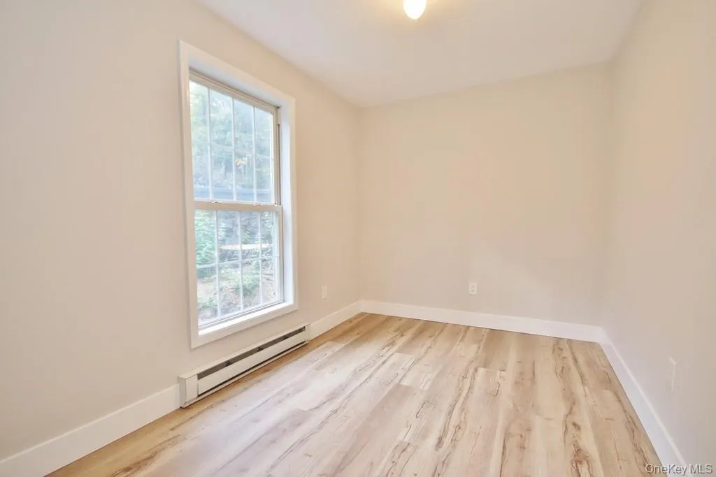 Bedroom in Cottage has new floors Bedroom in Cottage has new floors