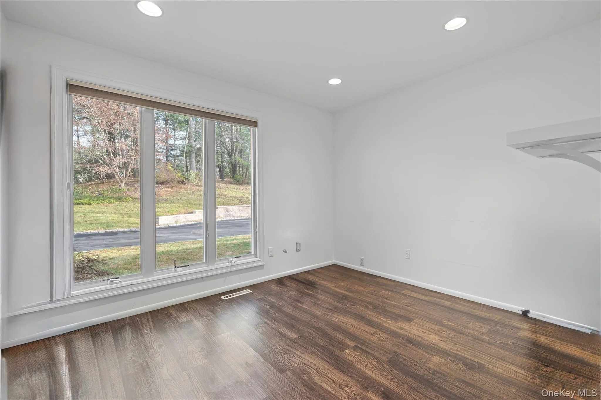 bedroom on 1st floor with closet and large windows bedroom on 1st floor with closet and large windows