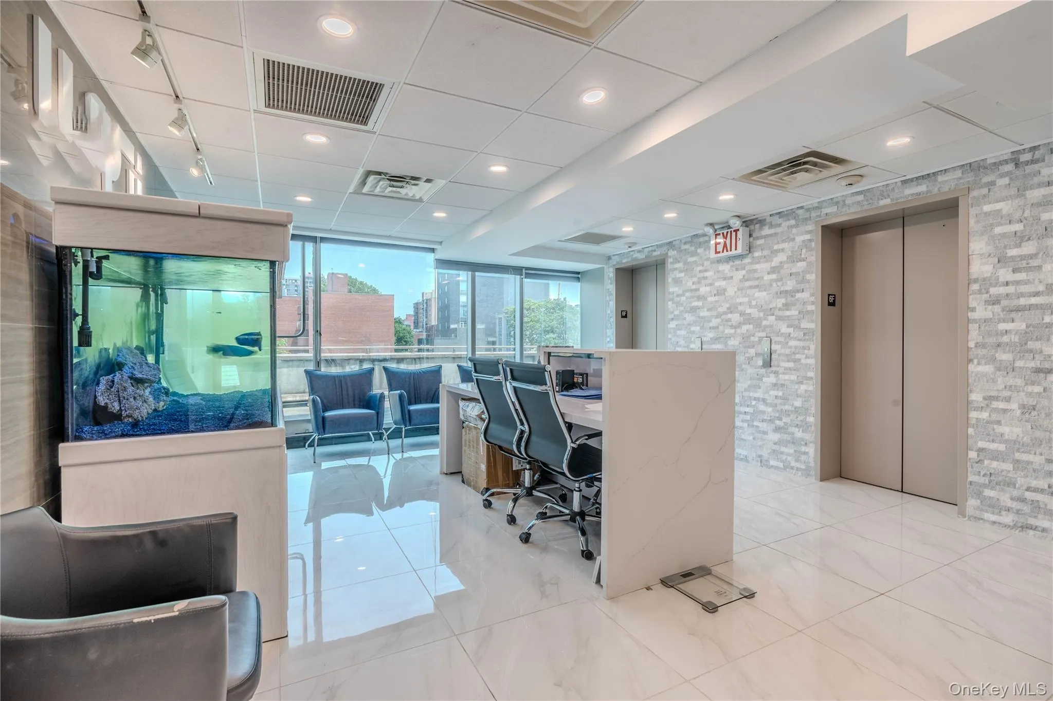 Office area featuring elevator and recessed lighting Office area featuring elevator and recessed lighting