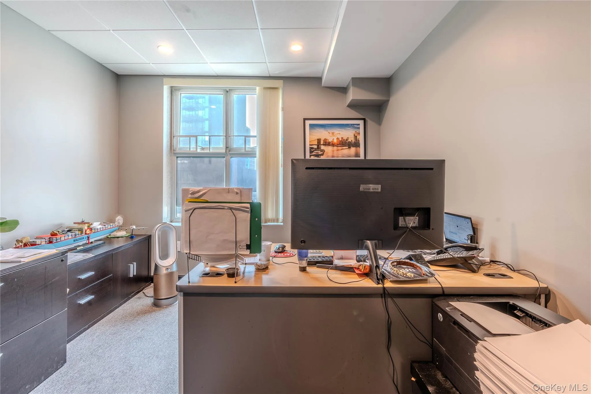 Home office with a drop ceiling Home office with a drop ceiling