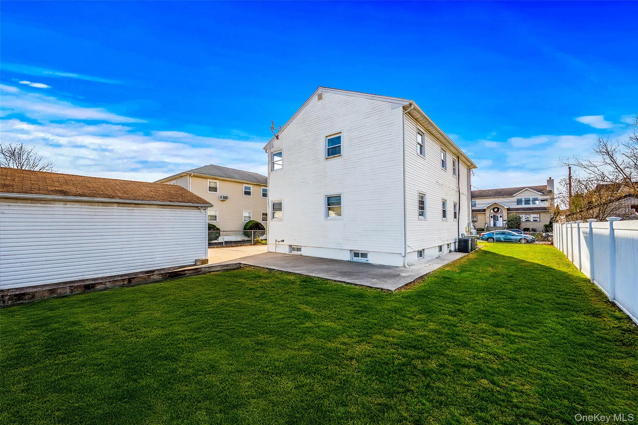 Rear view of property with a patio Rear view of property with a patio