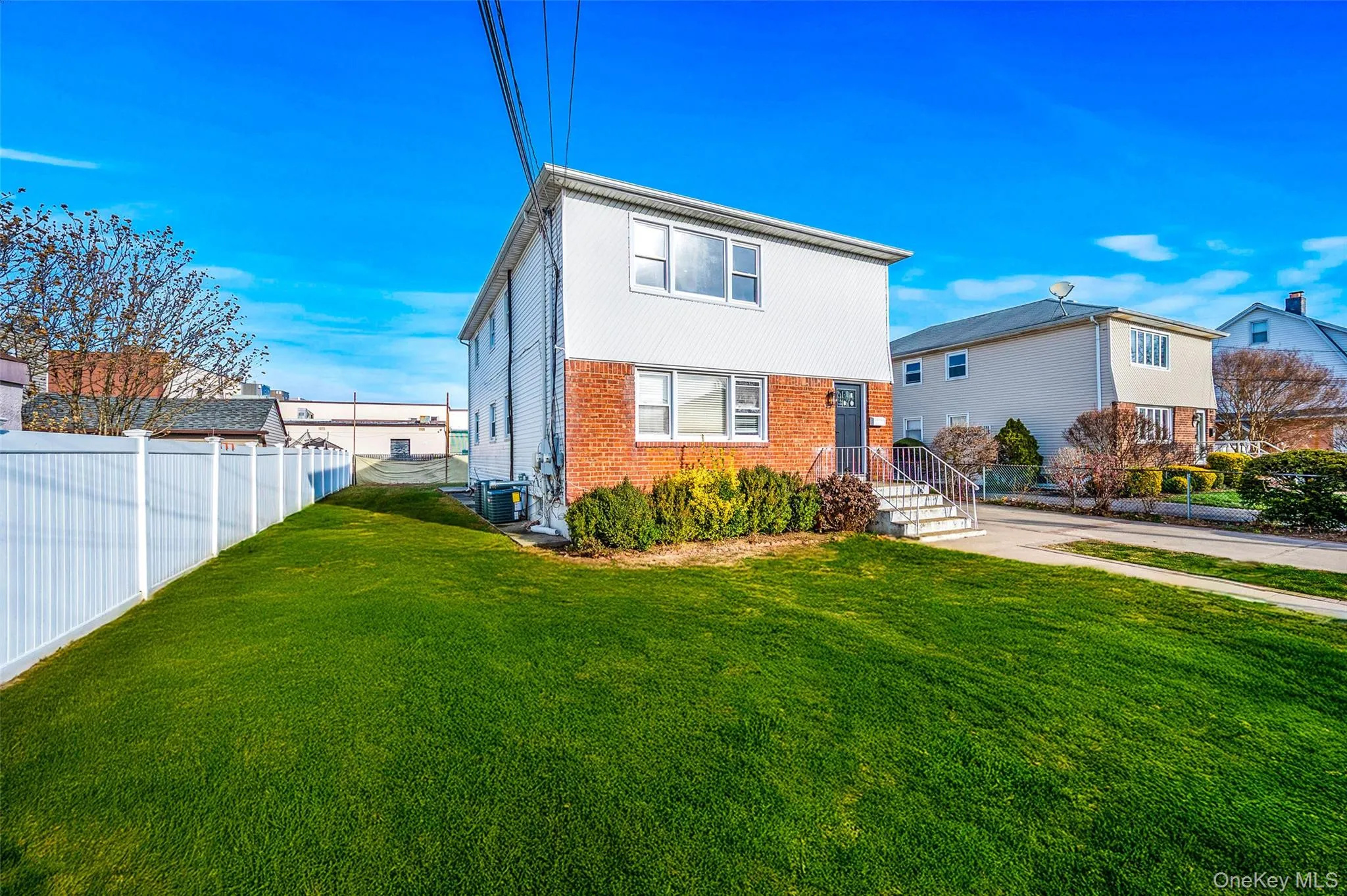 Traditional-style home featuring brick siding Traditional-style home featuring brick siding