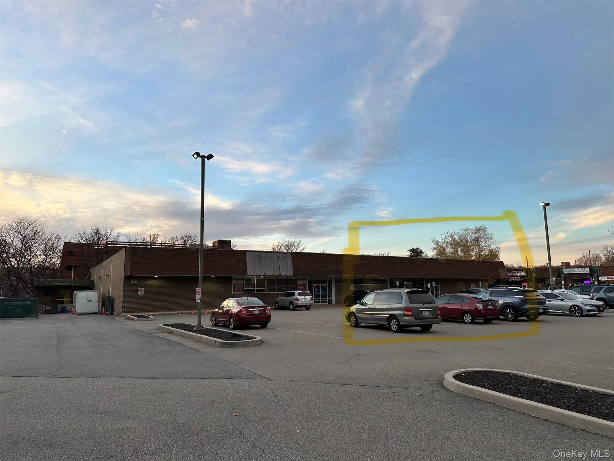 View of commercial location with uncovered parking View of commercial location with uncovered parking