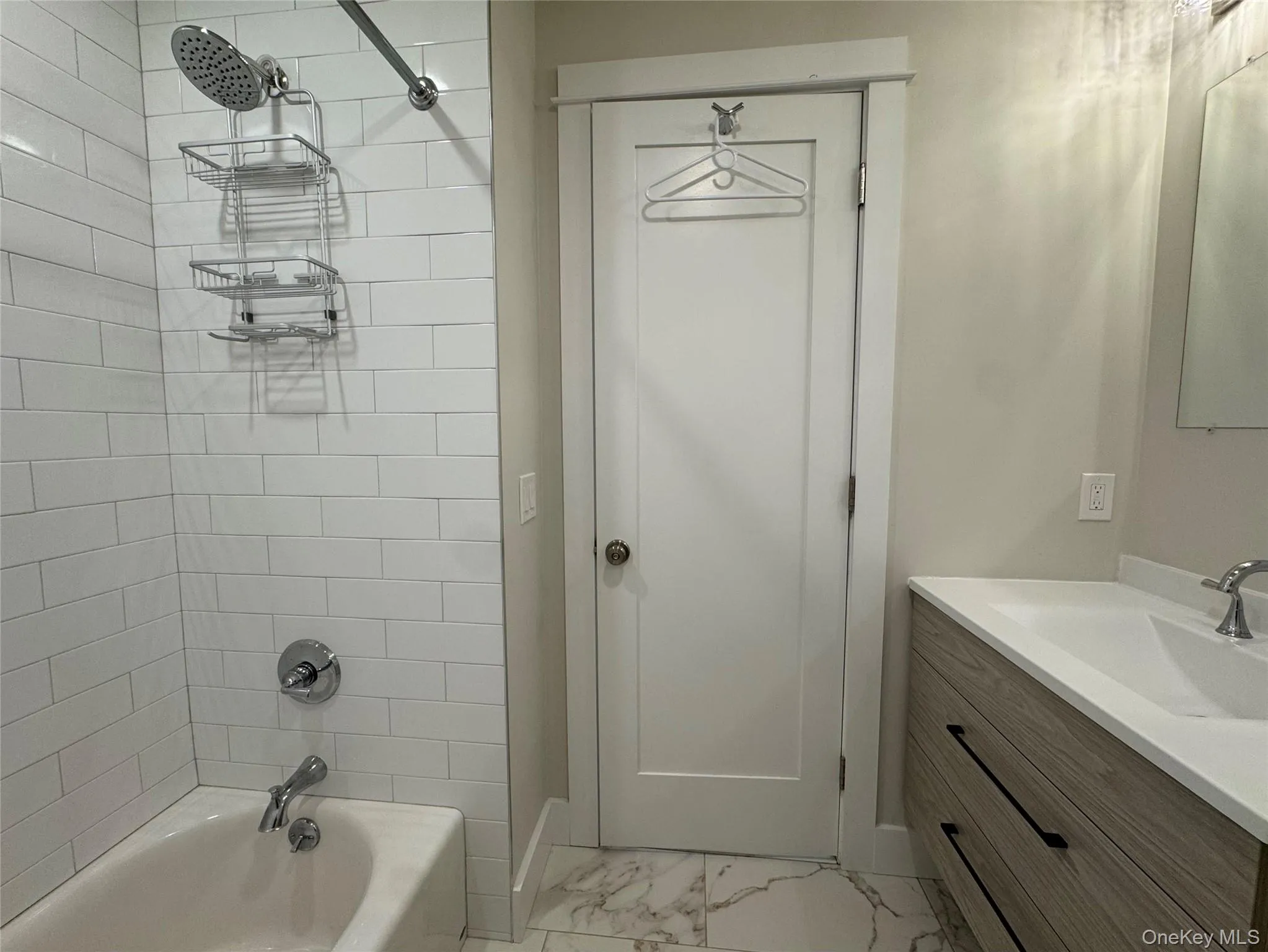 Bathroom featuring shower combination and nice vanity Bathroom featuring shower combination and nice vanity