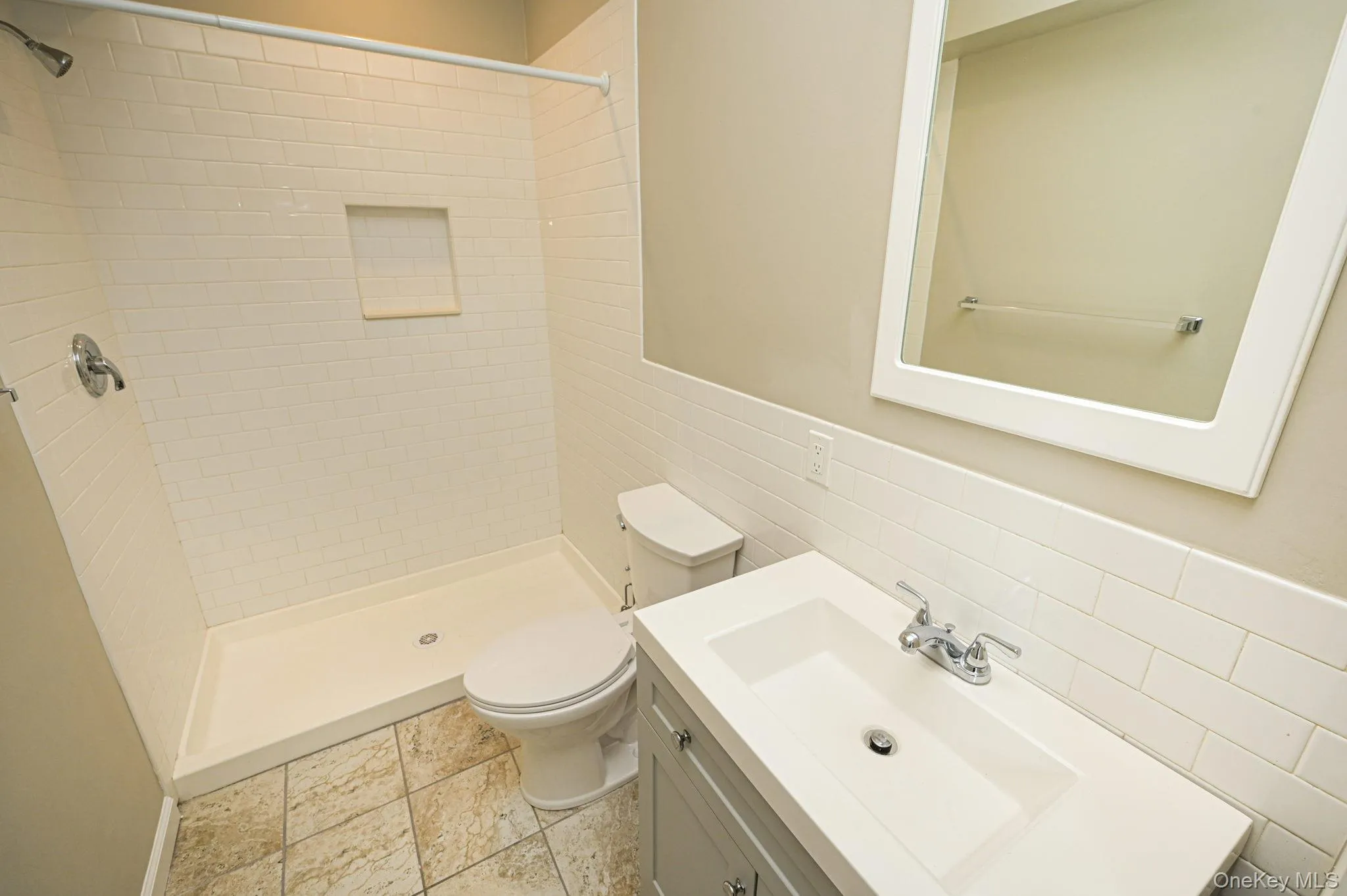 Bathroom with a stall shower, vanity Bathroom with a stall shower, vanity