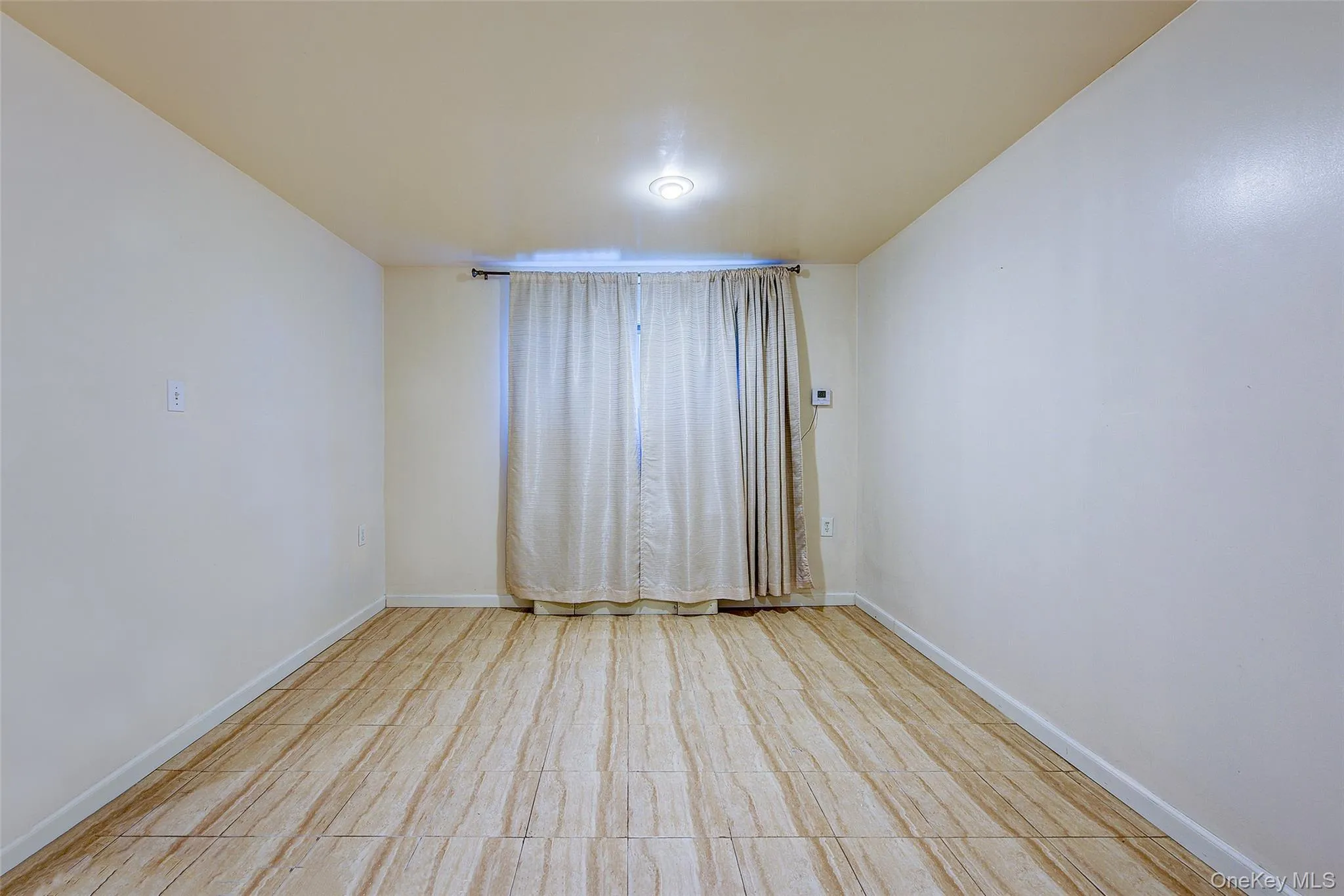 Unfurnished room featuring baseboards Unfurnished room featuring baseboards