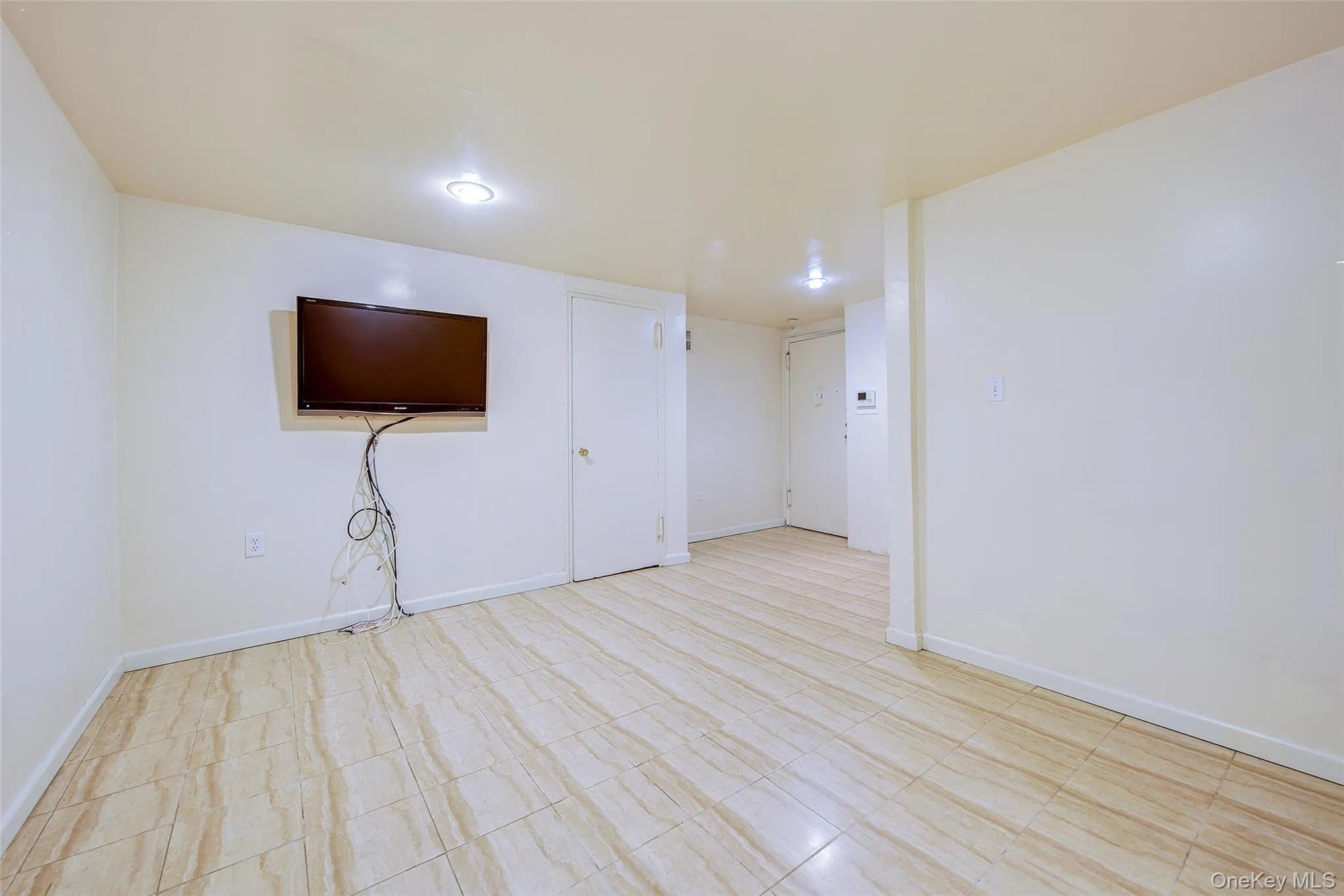Finished basement featuring baseboards Finished basement featuring baseboards