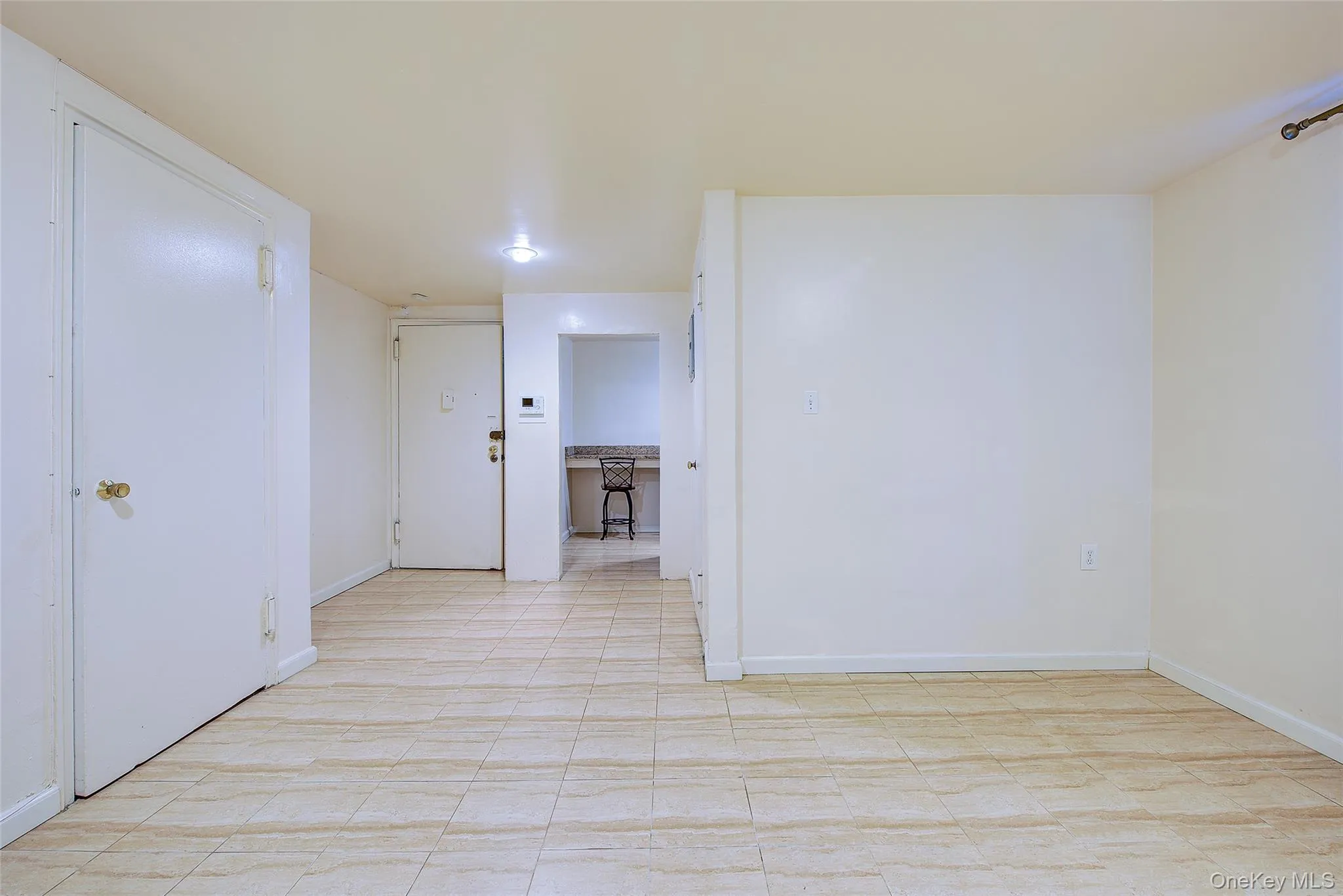 Unfurnished room featuring baseboards Unfurnished room featuring baseboards