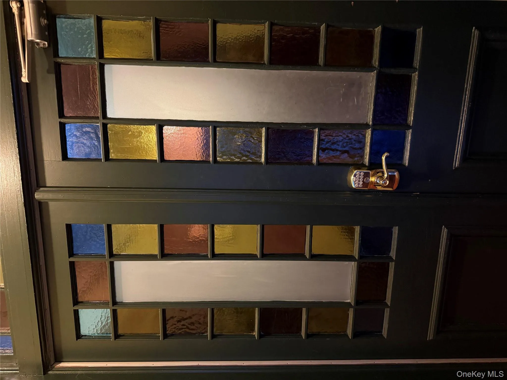 Original stained glass doors in the interior entry. Original stained glass doors in the interior entry.