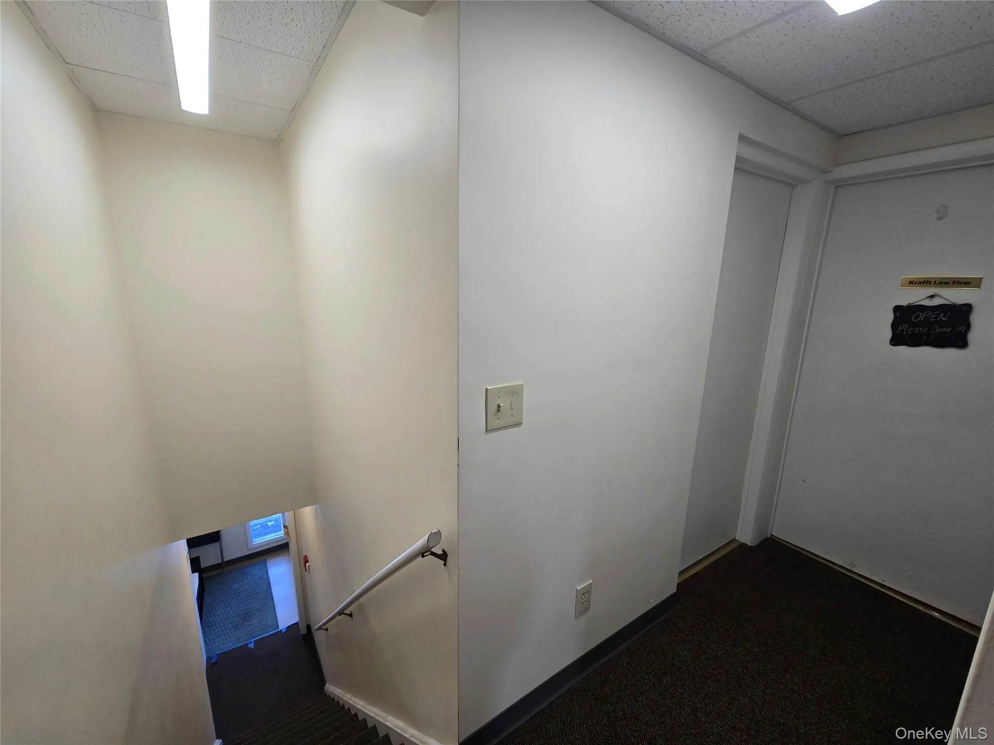 Hallway to entry door of office space, 2nd floor Hallway to entry door of office space, 2nd floor