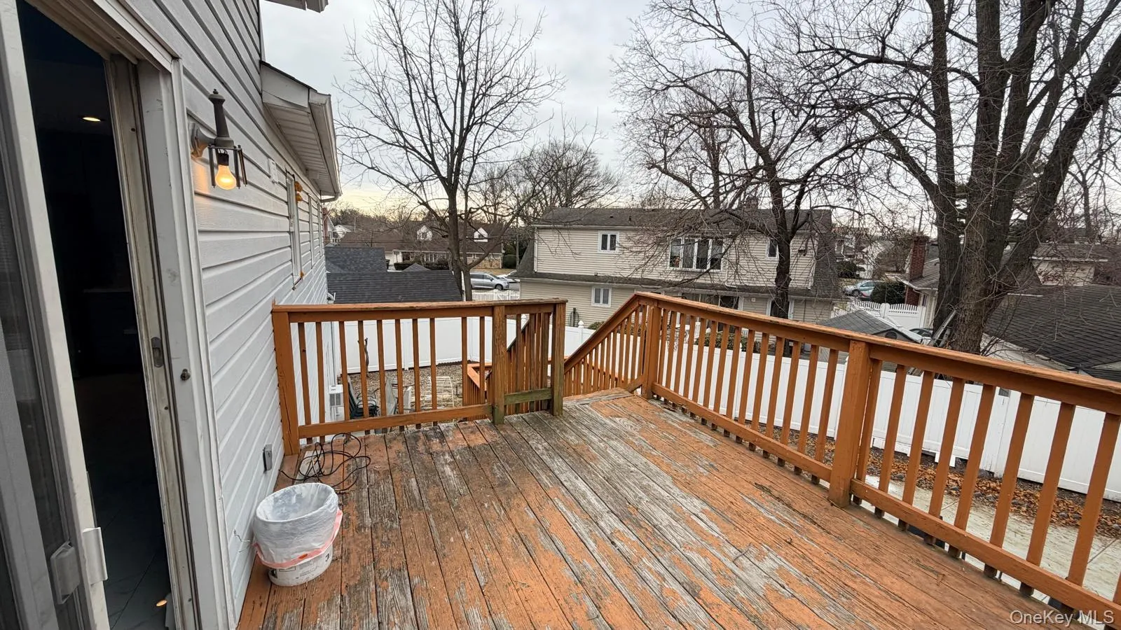 Wooden deck with a residential view Wooden deck with a residential view
