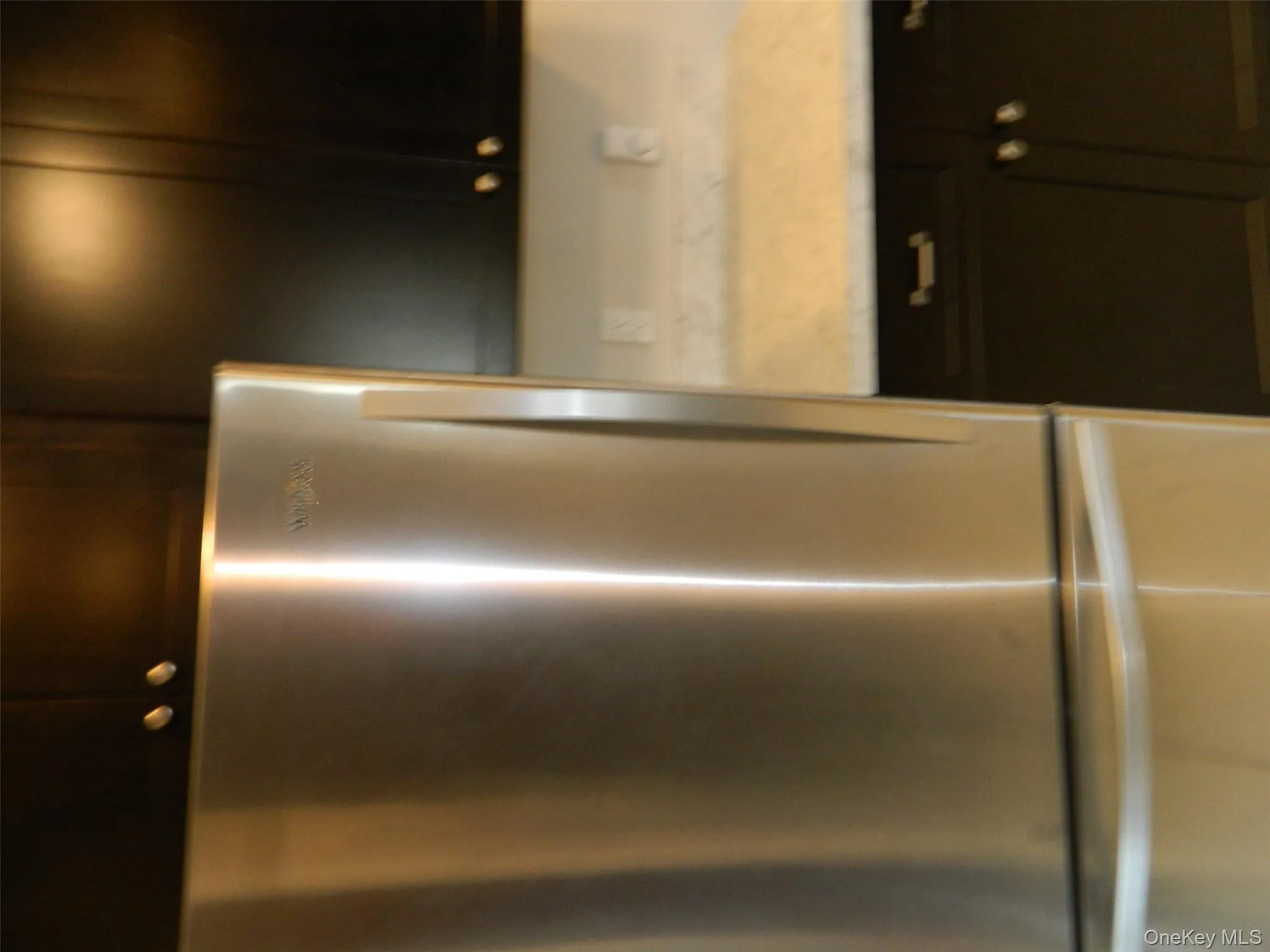 Kitchen with freestanding refrigerator Kitchen with freestanding refrigerator