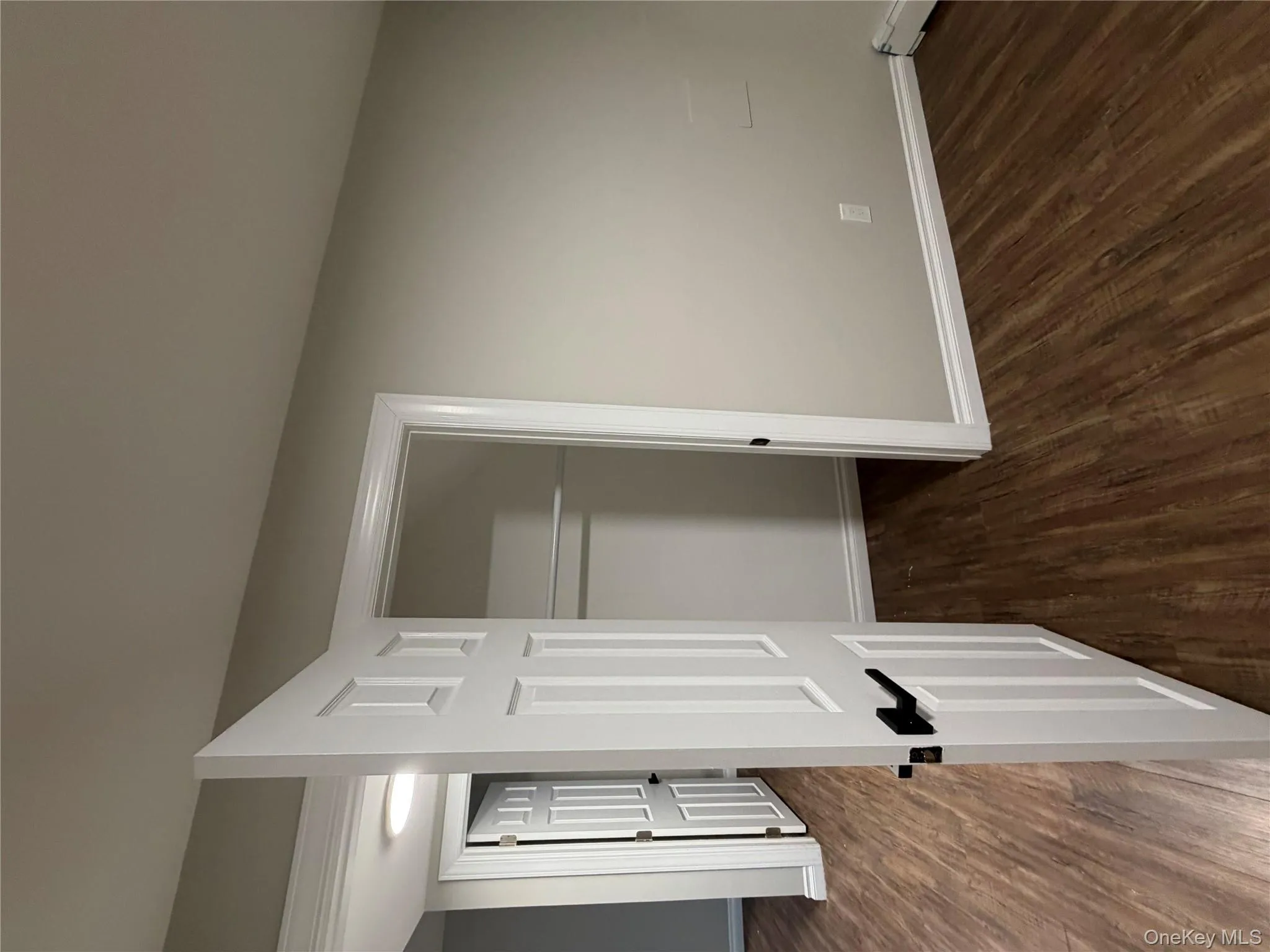 Closet featuring baseboard heating Closet featuring baseboard heating