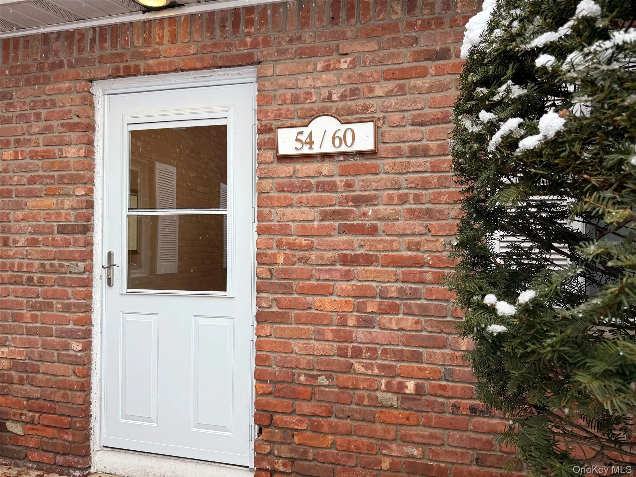 Building entrance leads to the ground floor unit. Building entrance leads to the ground floor unit.