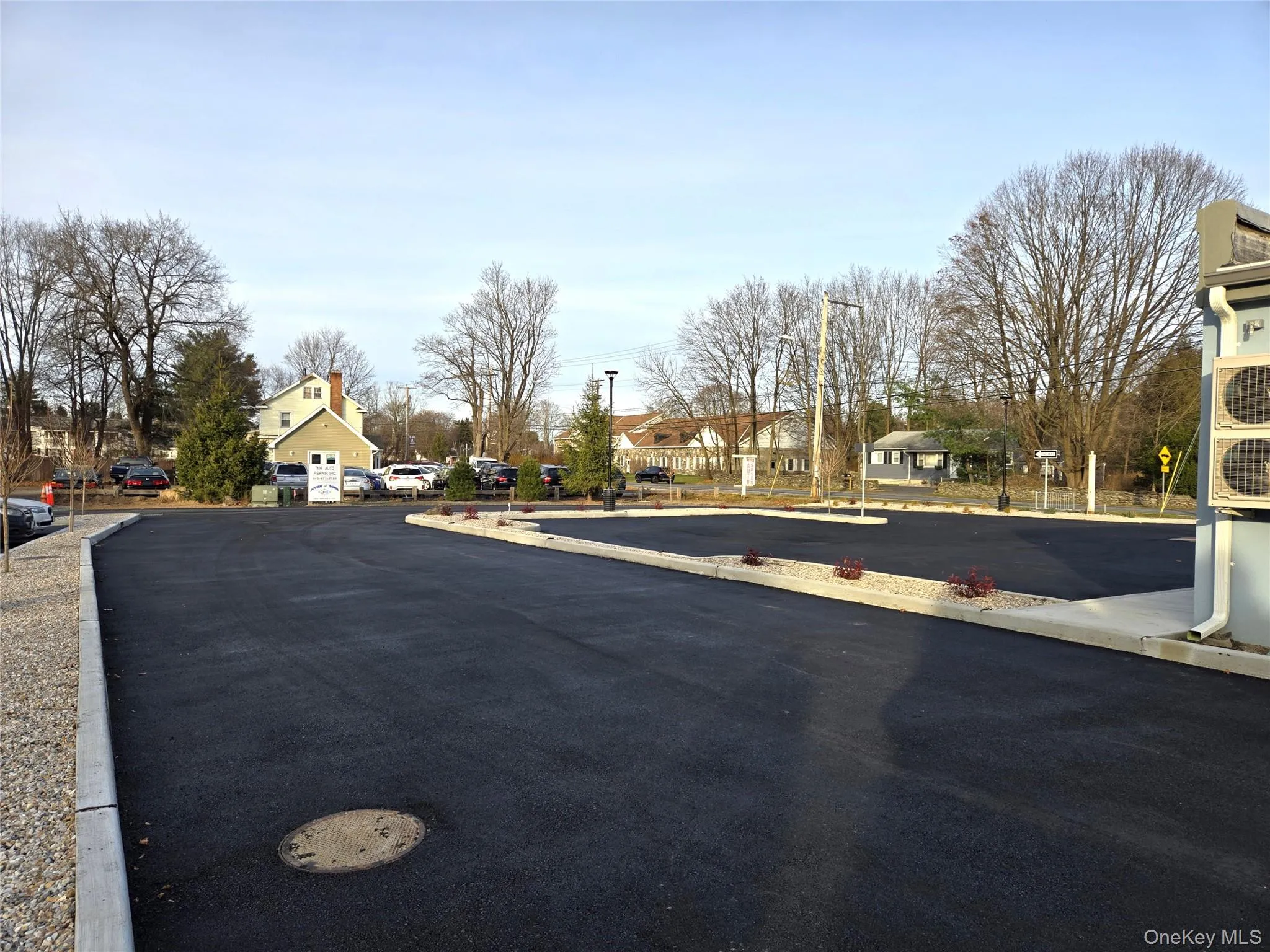 View of asphalt street with a residential view View of asphalt street with a residential view
