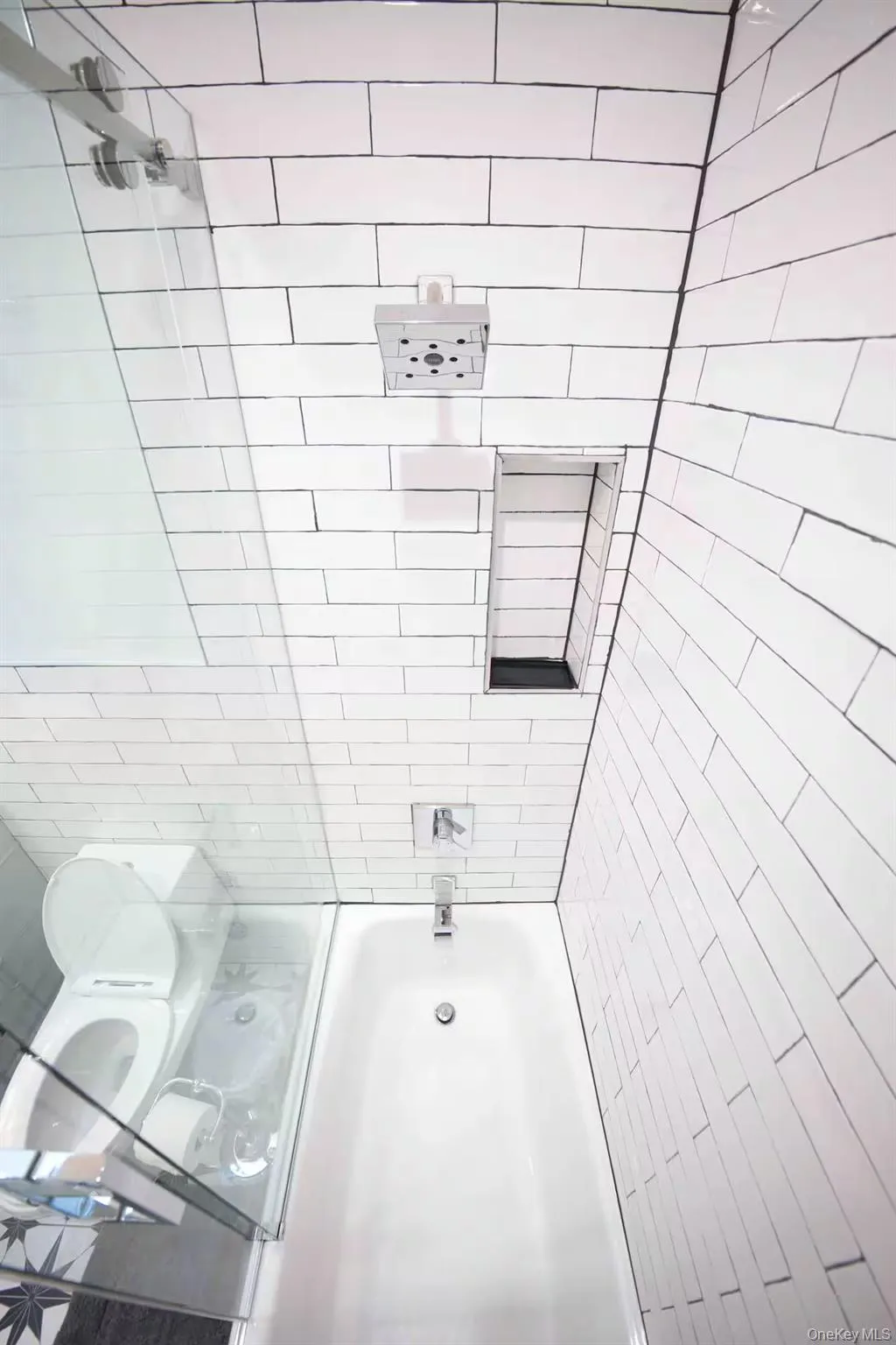 Bathroom with bathing tub / shower combination Bathroom with bathing tub / shower combination