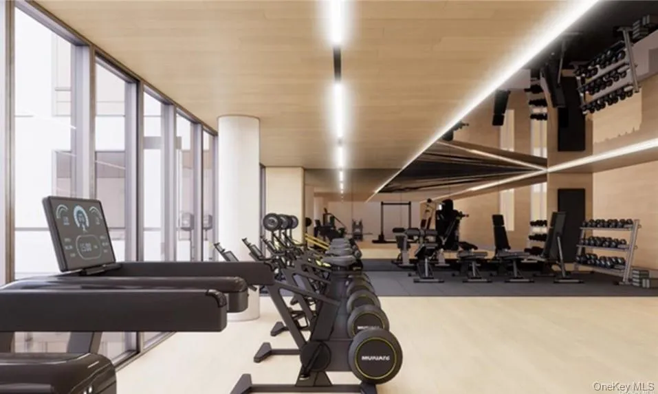 Workout area with floor to ceiling windows and wooden ceiling Workout area with floor to ceiling windows and wooden ceiling