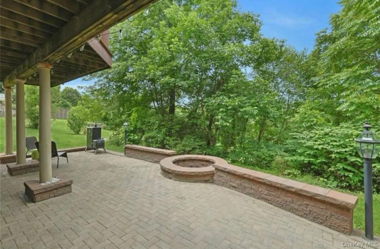 View of patio featuring an outdoor fire pit View of patio featuring an outdoor fire pit