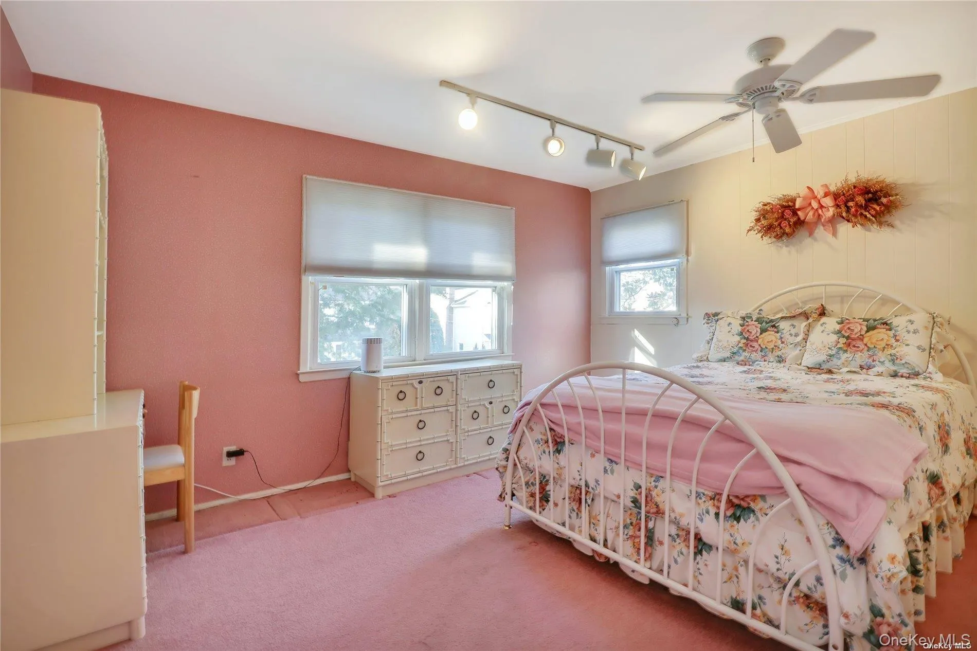 Bedroom with a ceiling fan Bedroom with a ceiling fan
