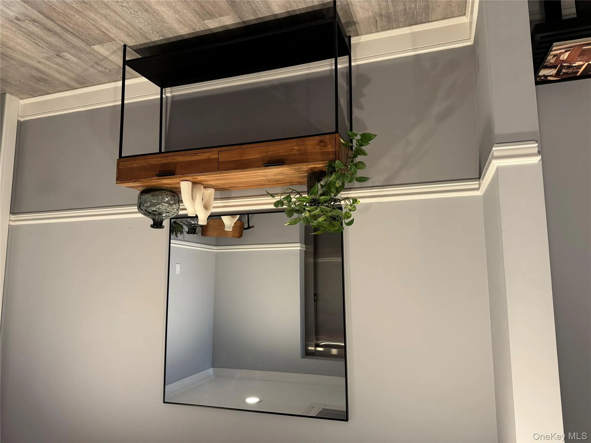 Detailed view of wood finished floors and recessed lighting Detailed view of wood finished floors and recessed lighting