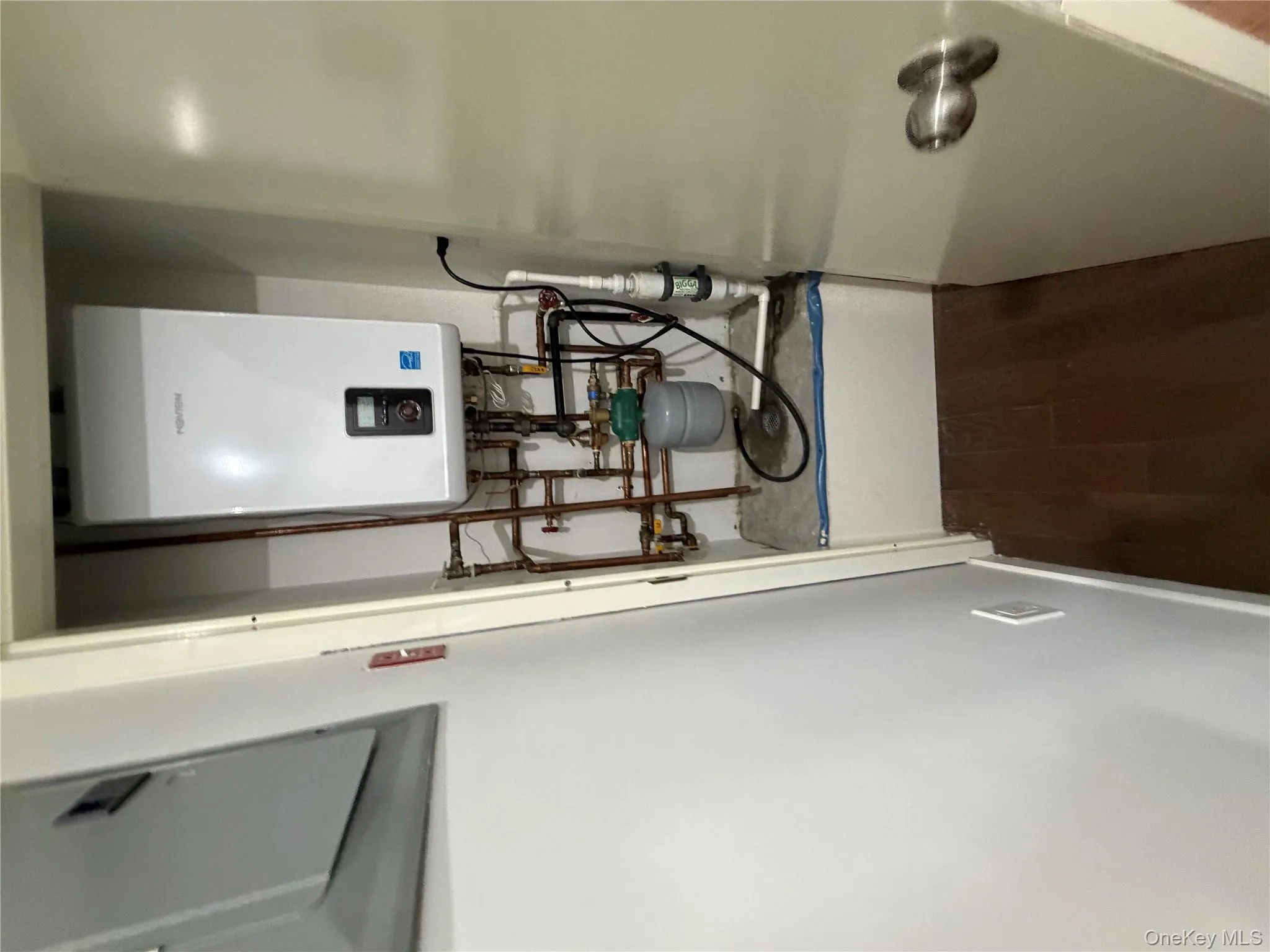 Utilities with water heater and electric panel Utilities with water heater and electric panel