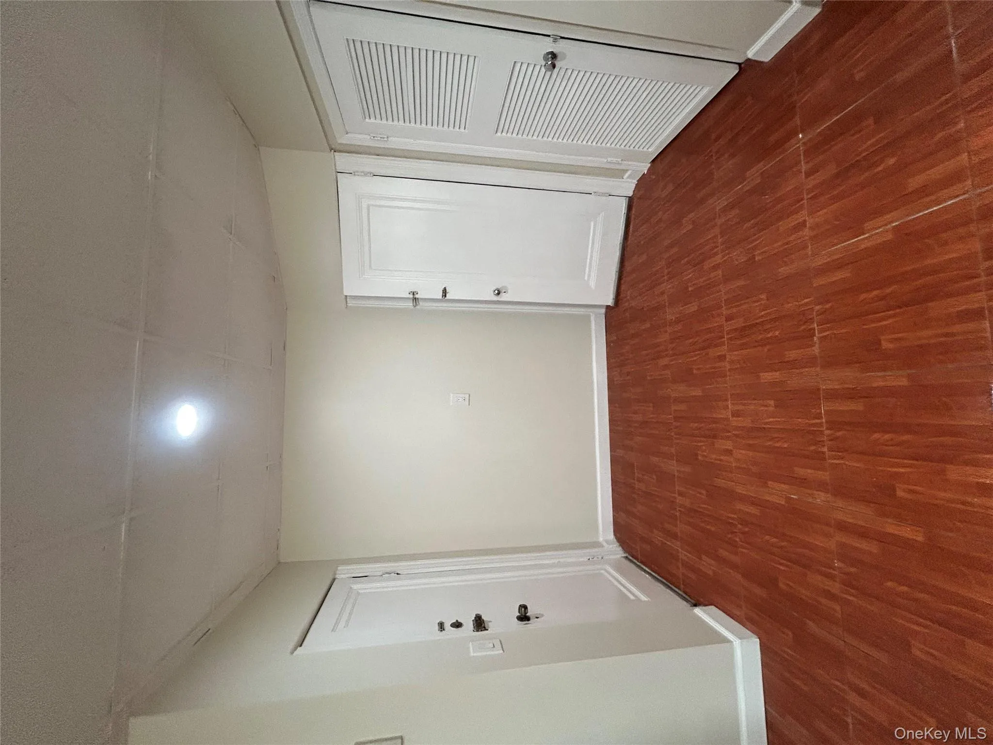 Unfurnished room featuring dark wood finished floors and recessed lighting Unfurnished room featuring dark wood finished floors and recessed lighting