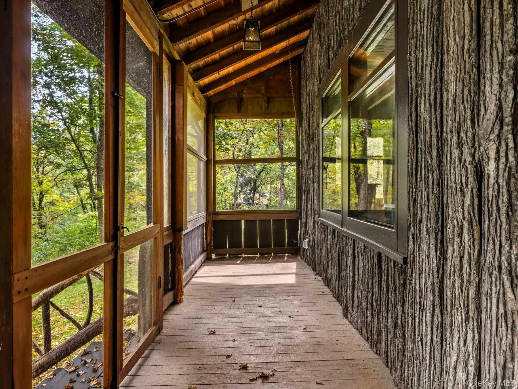 Unfurnished sunroom with lofted ceiling Unfurnished sunroom with lofted ceiling