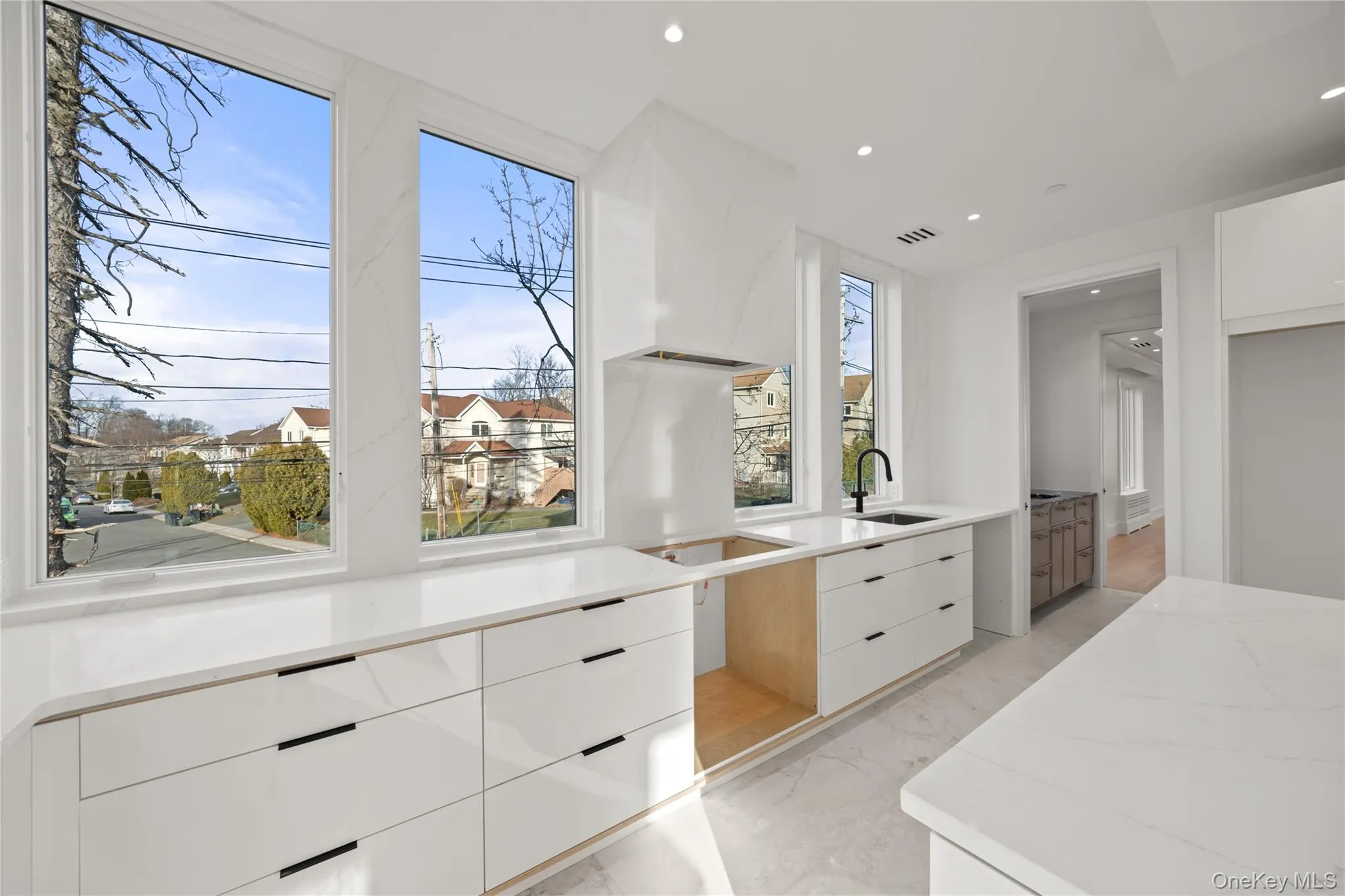 Kitchen featuring oversized windows with panoramic views Kitchen featuring oversized windows with panoramic views