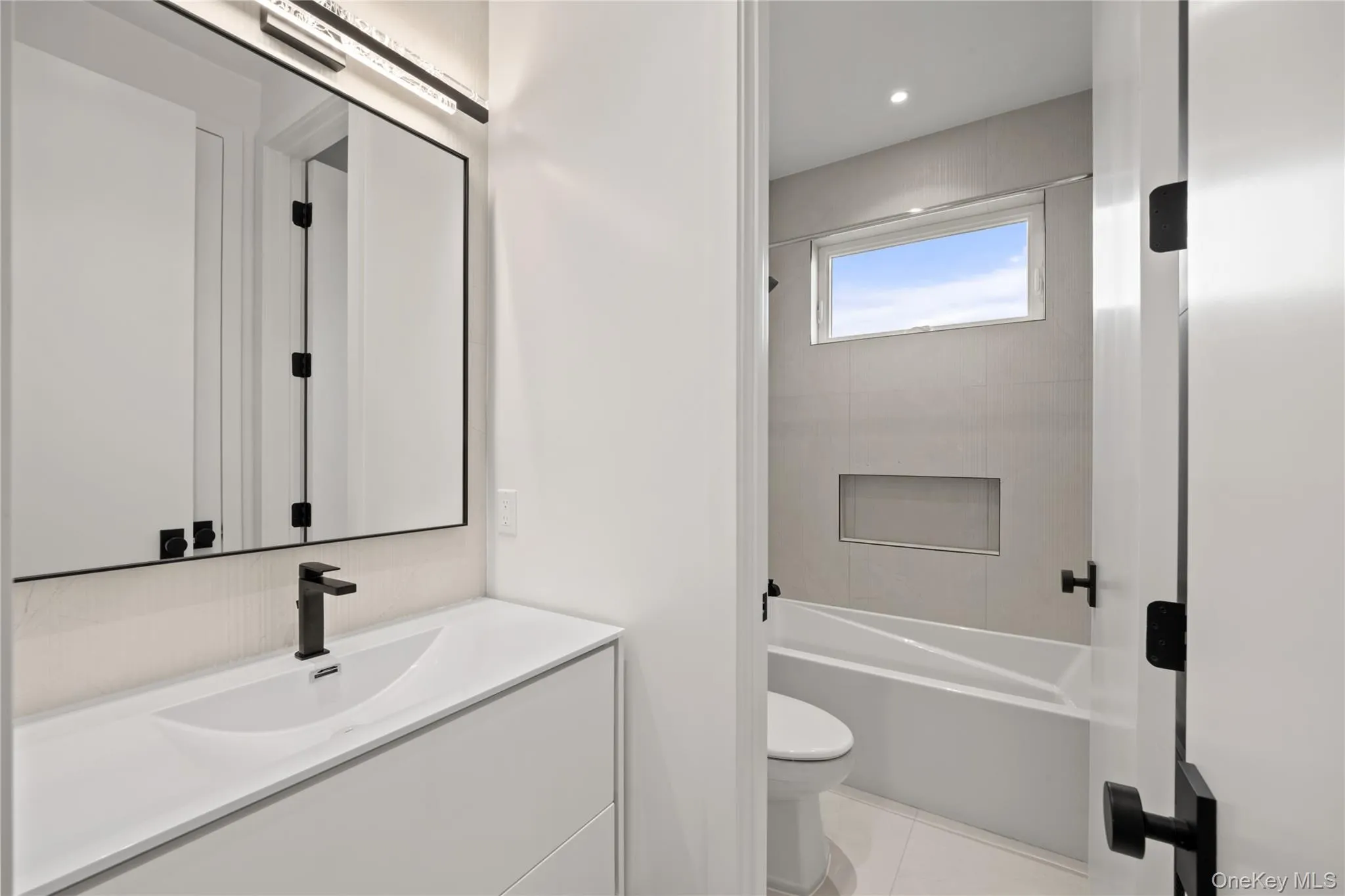 Bathroom featuring LED Backlit Vanity Lighting Bathroom featuring LED Backlit Vanity Lighting