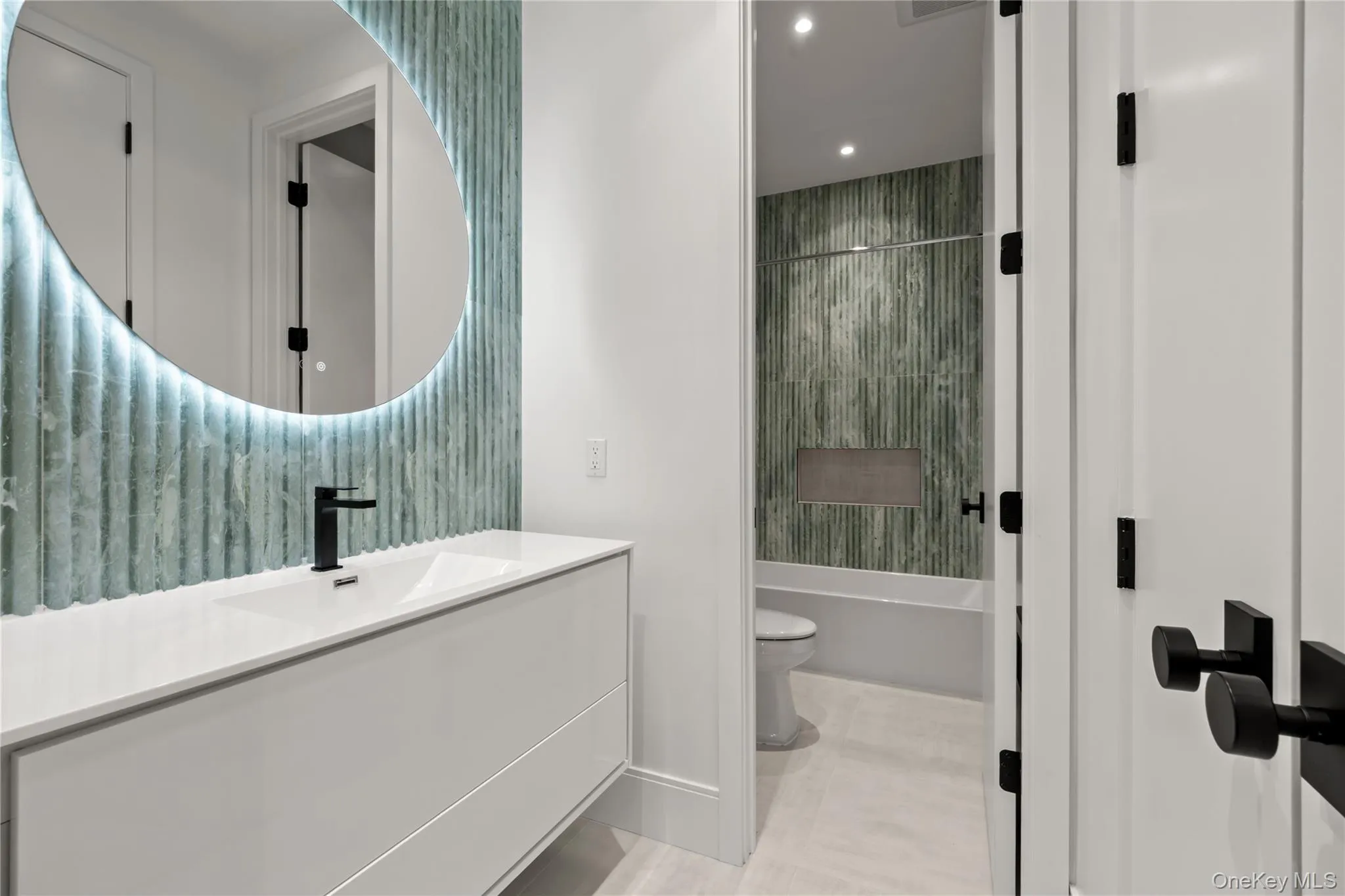 Bathroom featuring LED Backlit Vanity Lighting Bathroom featuring LED Backlit Vanity Lighting