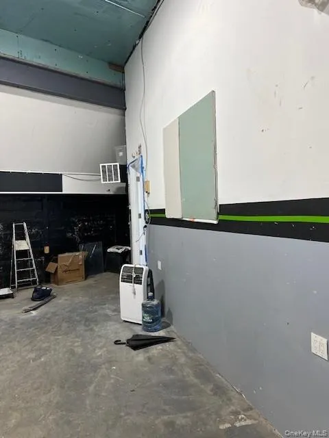 Misc room featuring concrete flooring Misc room featuring concrete flooring