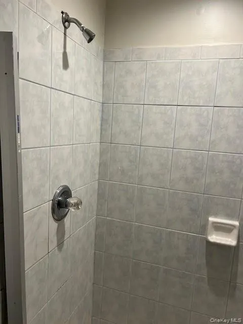 Bathroom view of a tile shower Bathroom view of a tile shower