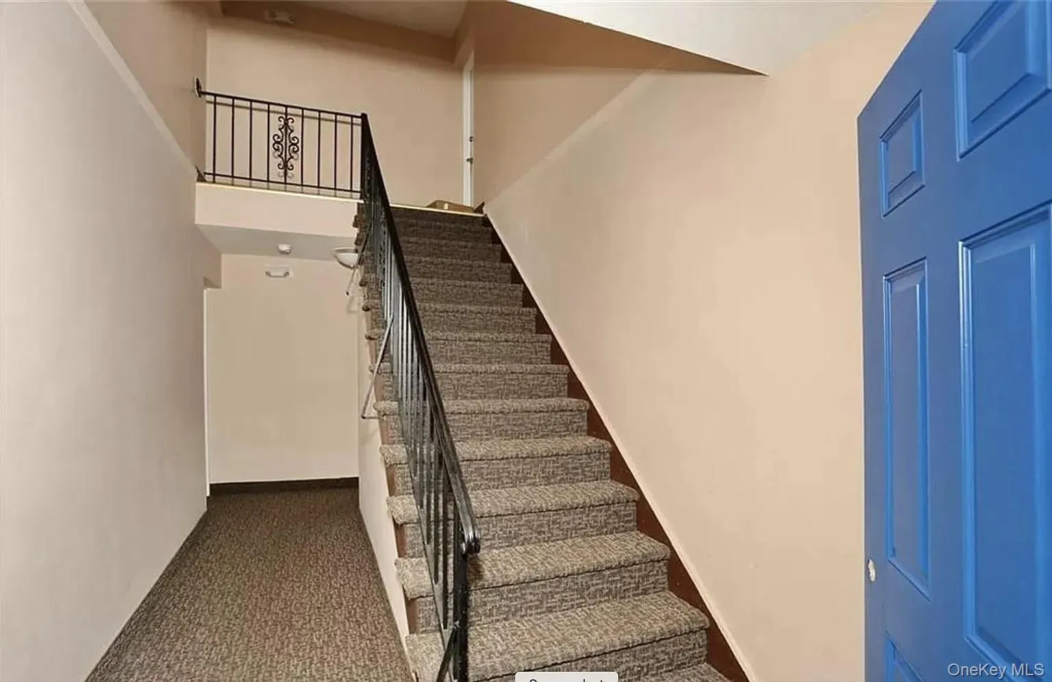 Staircase leading up to the unit Staircase leading up to the unit