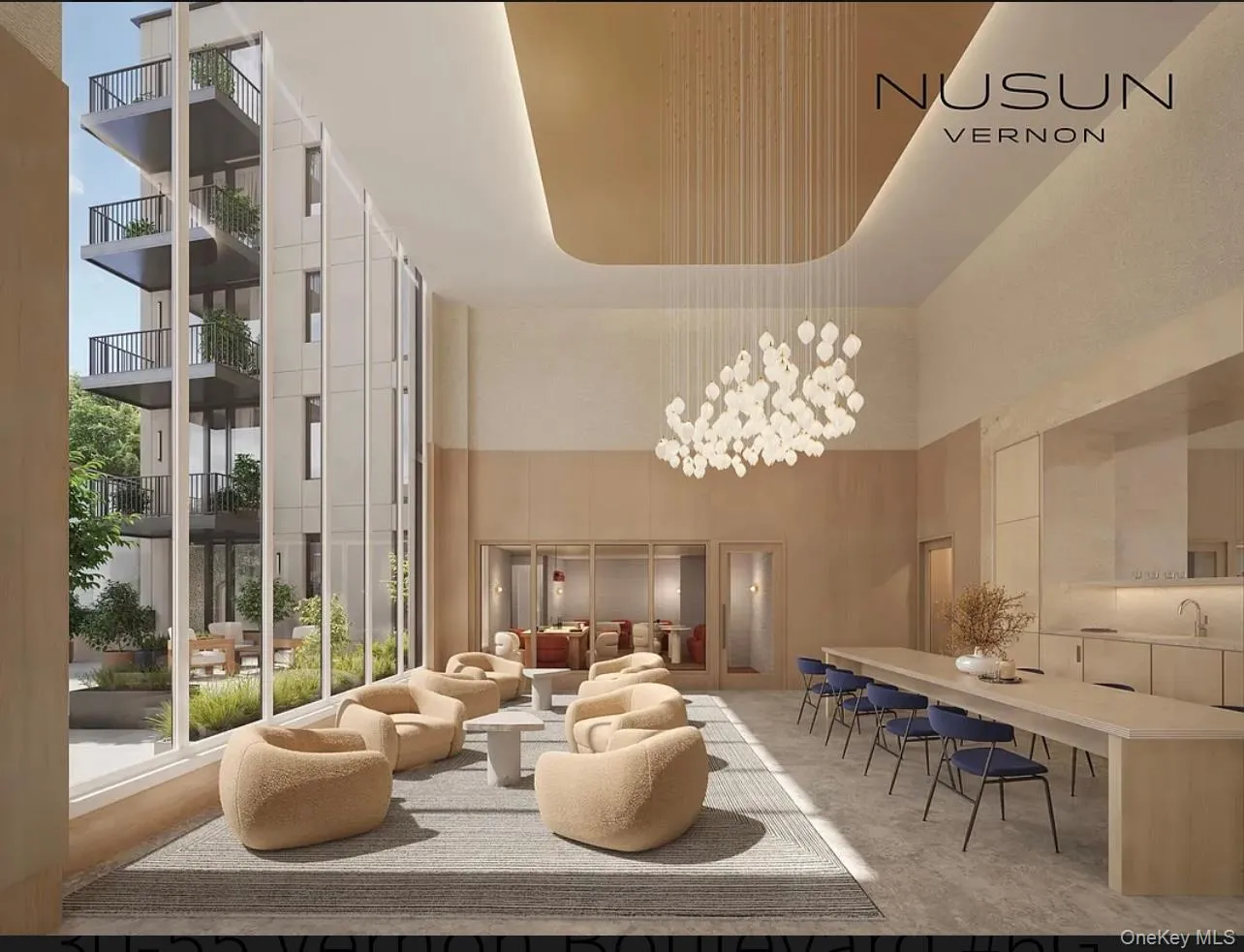 Common area with a high ceiling and floor to ceiling windows Common area with a high ceiling and floor to ceiling windows