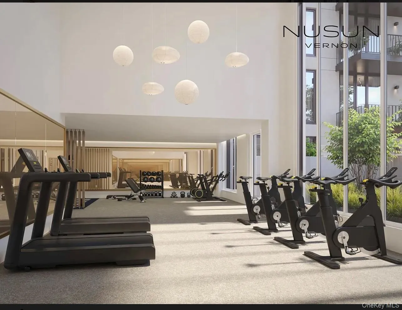 Workout area with a high ceiling Workout area with a high ceiling