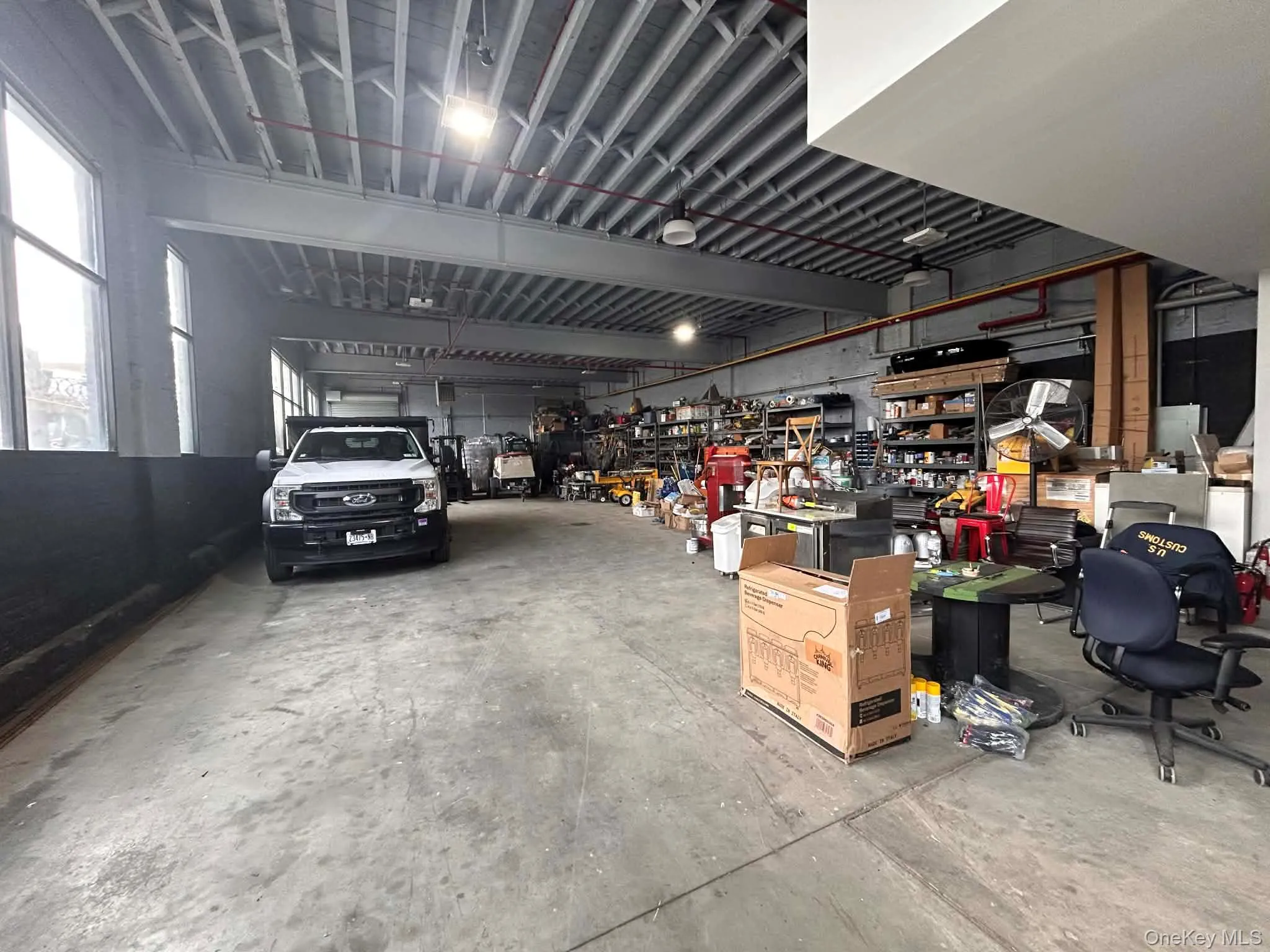 Garage with a workshop area Garage with a workshop area