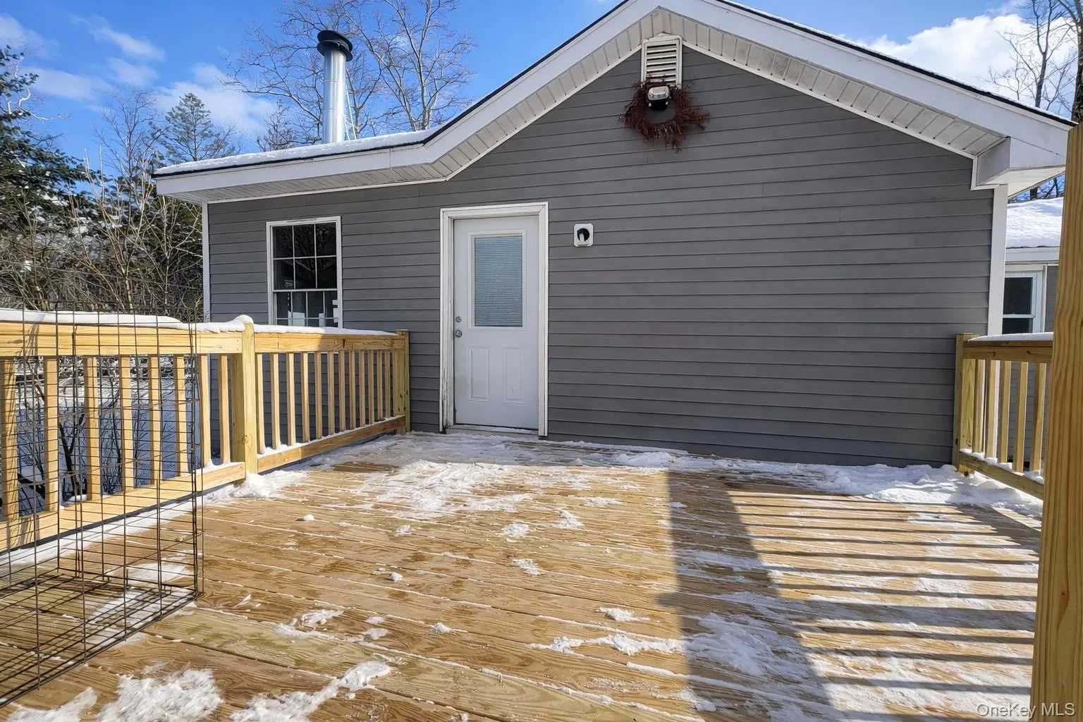 View of snow covered deck View of snow covered deck