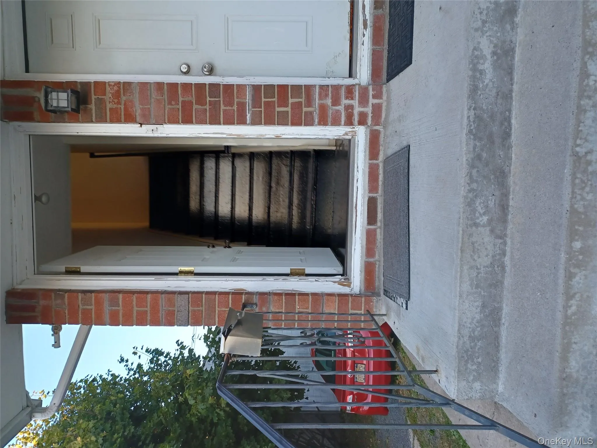 Doorway to property with brick siding Doorway to property with brick siding