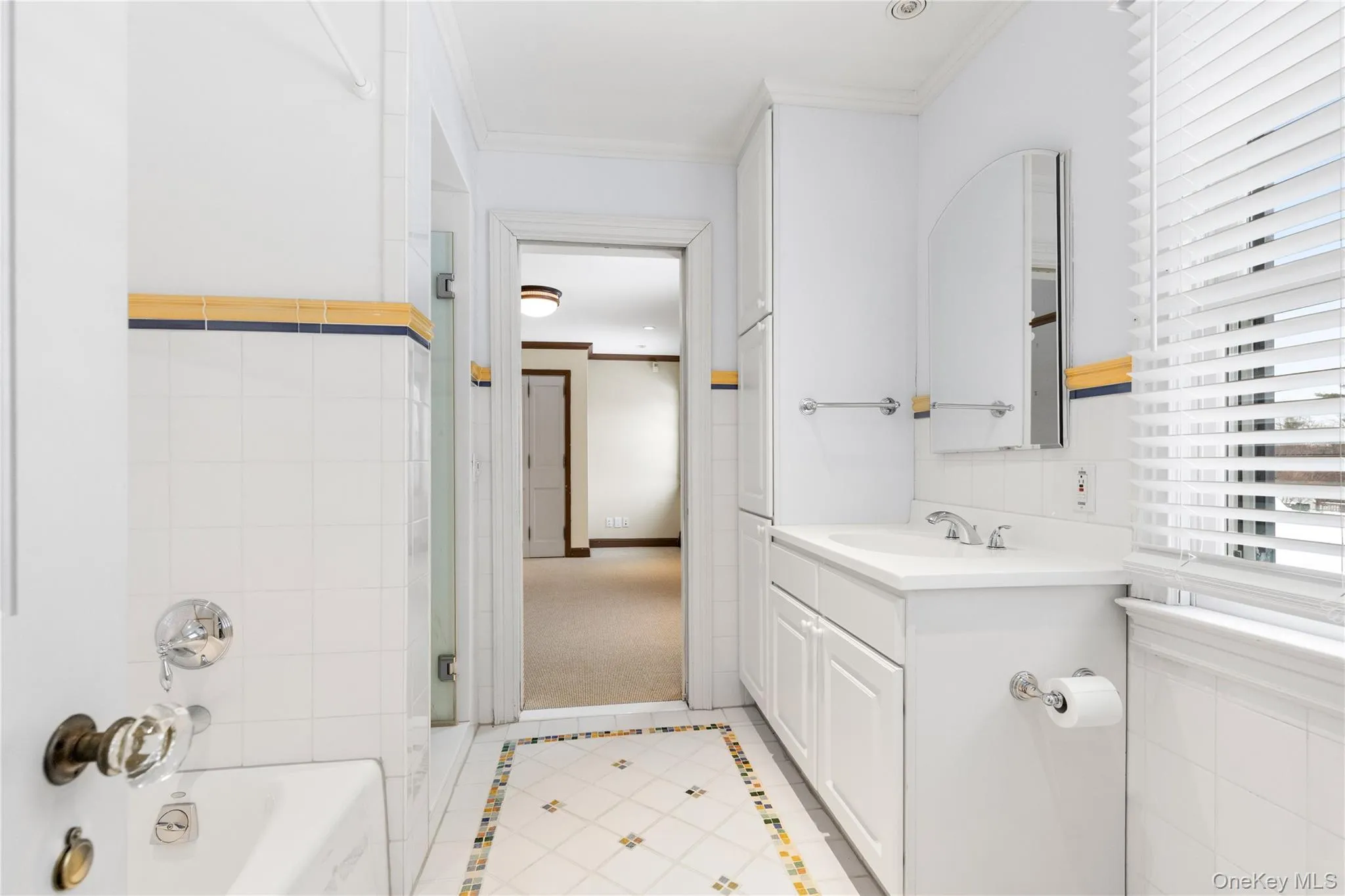 Two generous bedrooms share this Jack & Jill bath with separate tub and shower Two generous bedrooms share this Jack & Jill bath with separate tub and shower