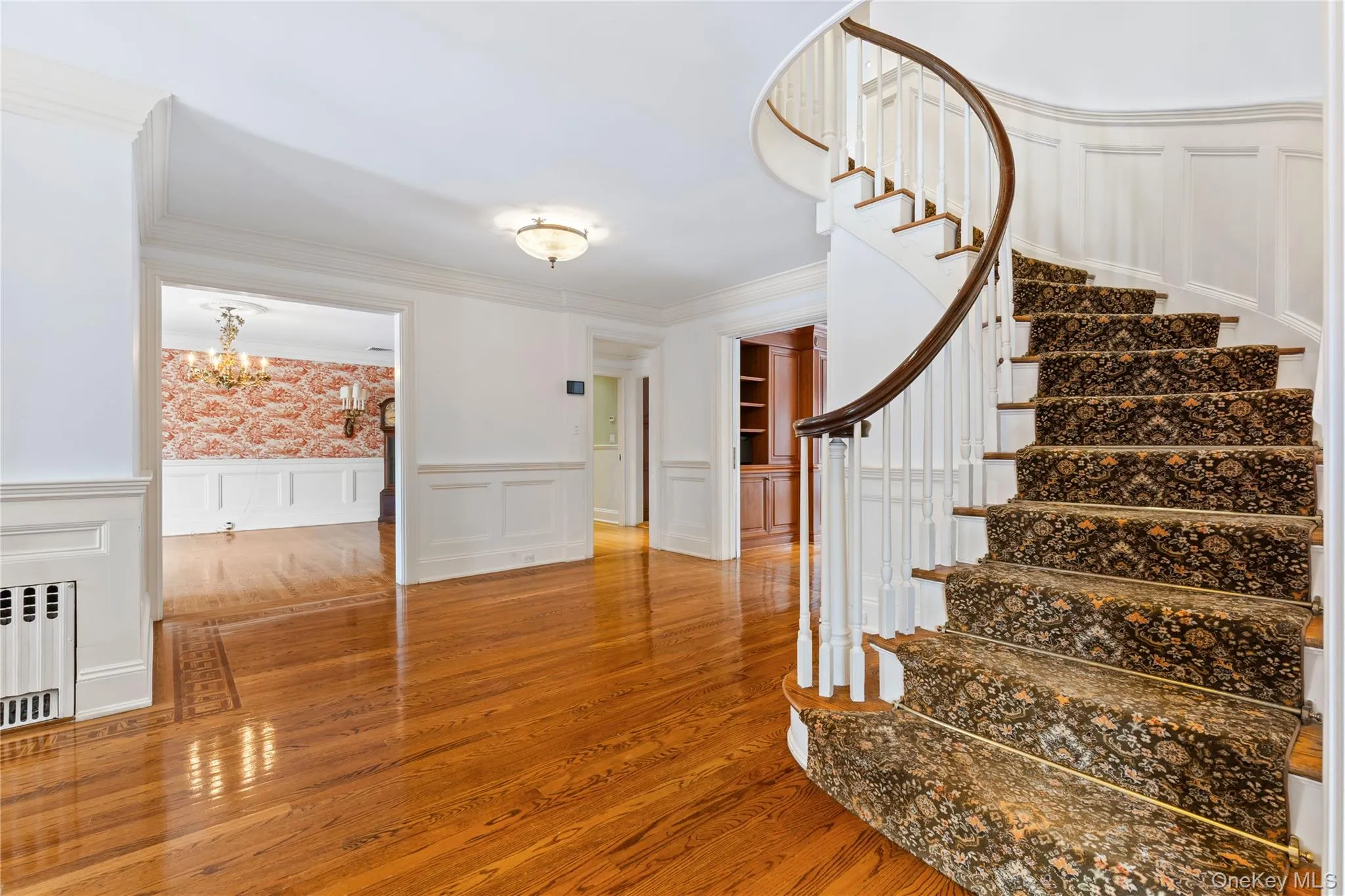 Stairs to second landing include beautiful paneling Stairs to second landing include beautiful paneling